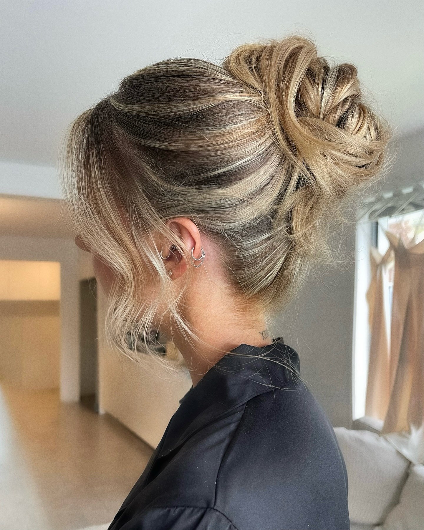 Effortless Textured Chignon With Face-Framing Strands