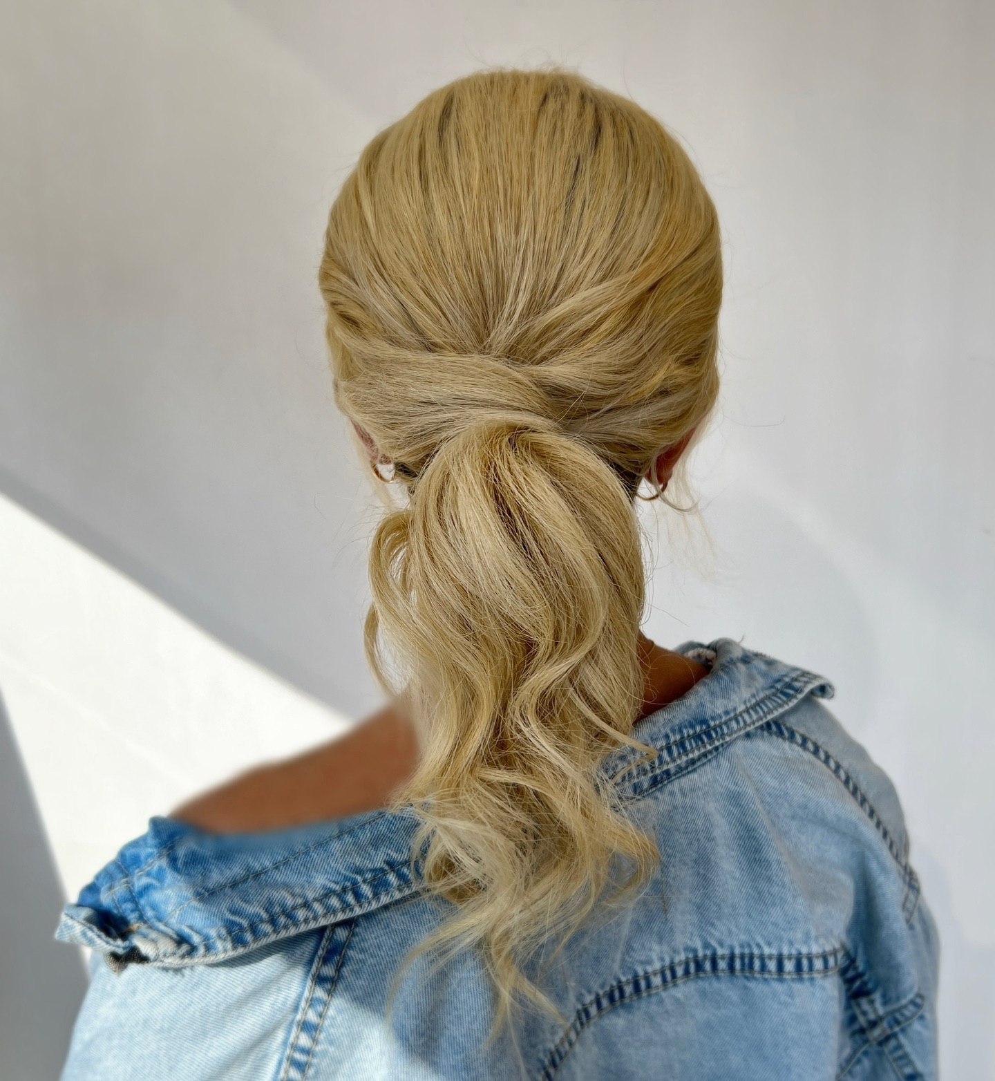 Effortless Twisted Low Ponytail With Soft Waves