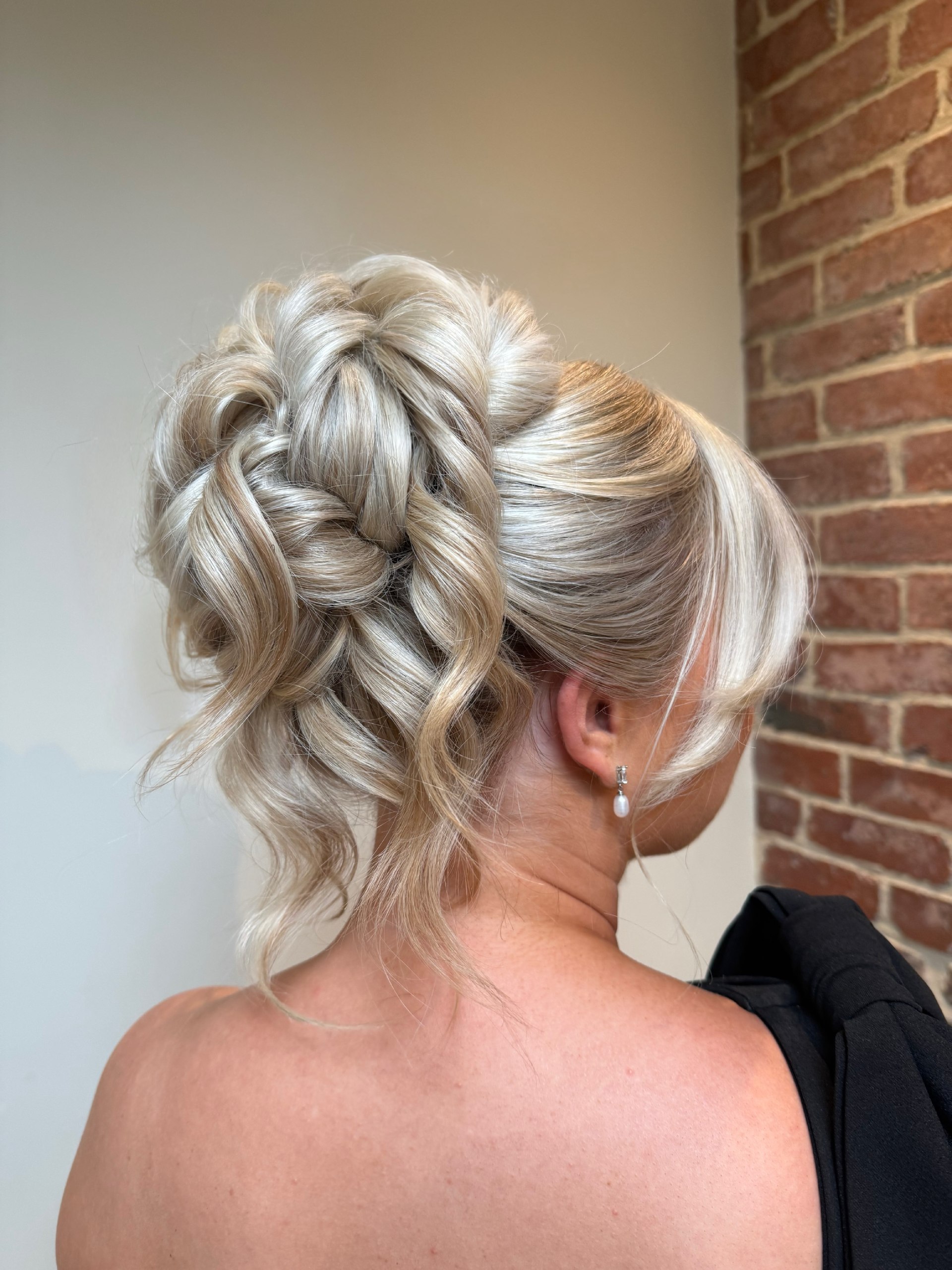 Elegant Braided Updo With Loose Curls