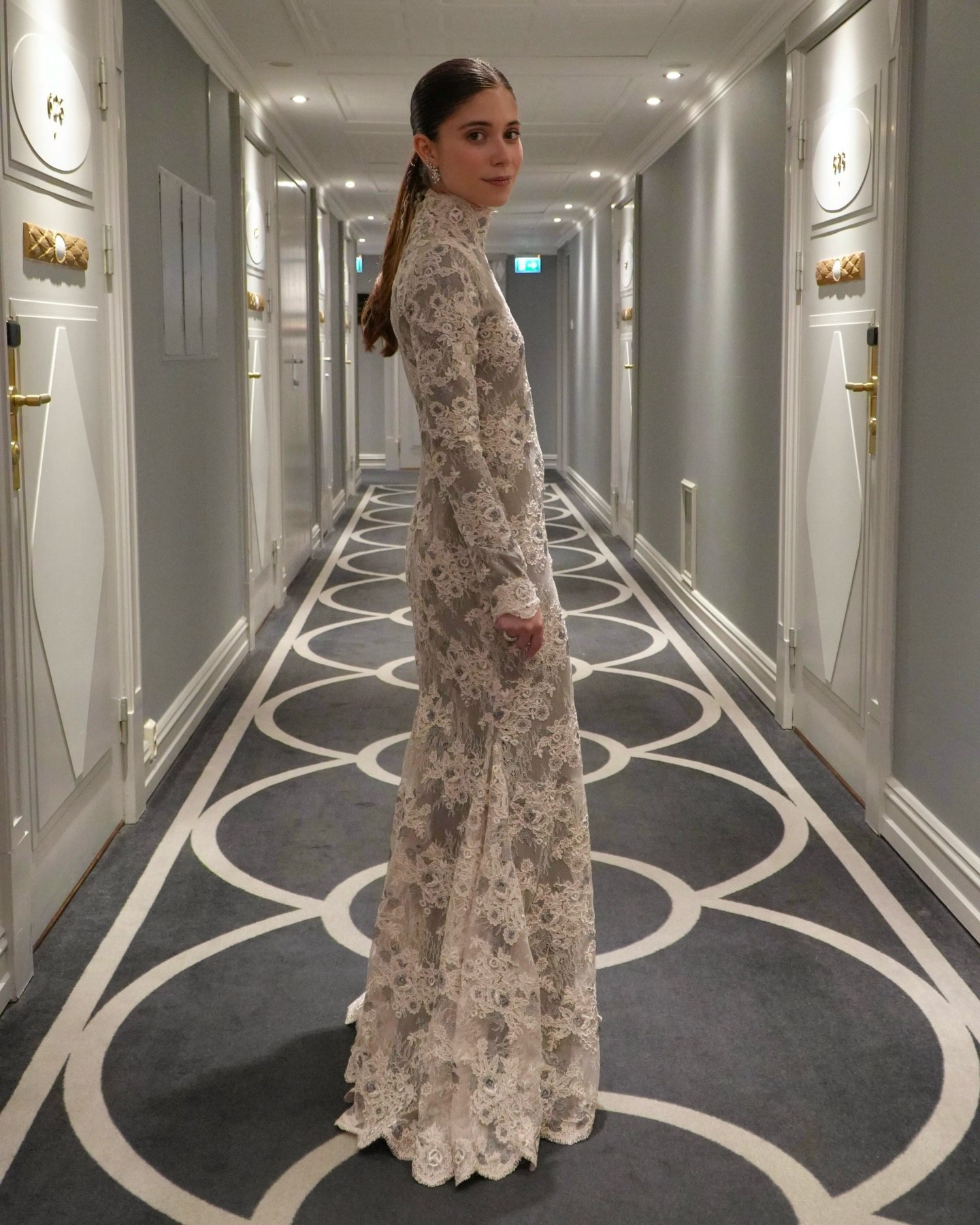 Elegant Lace High Neck Gown For A Winter Wedding