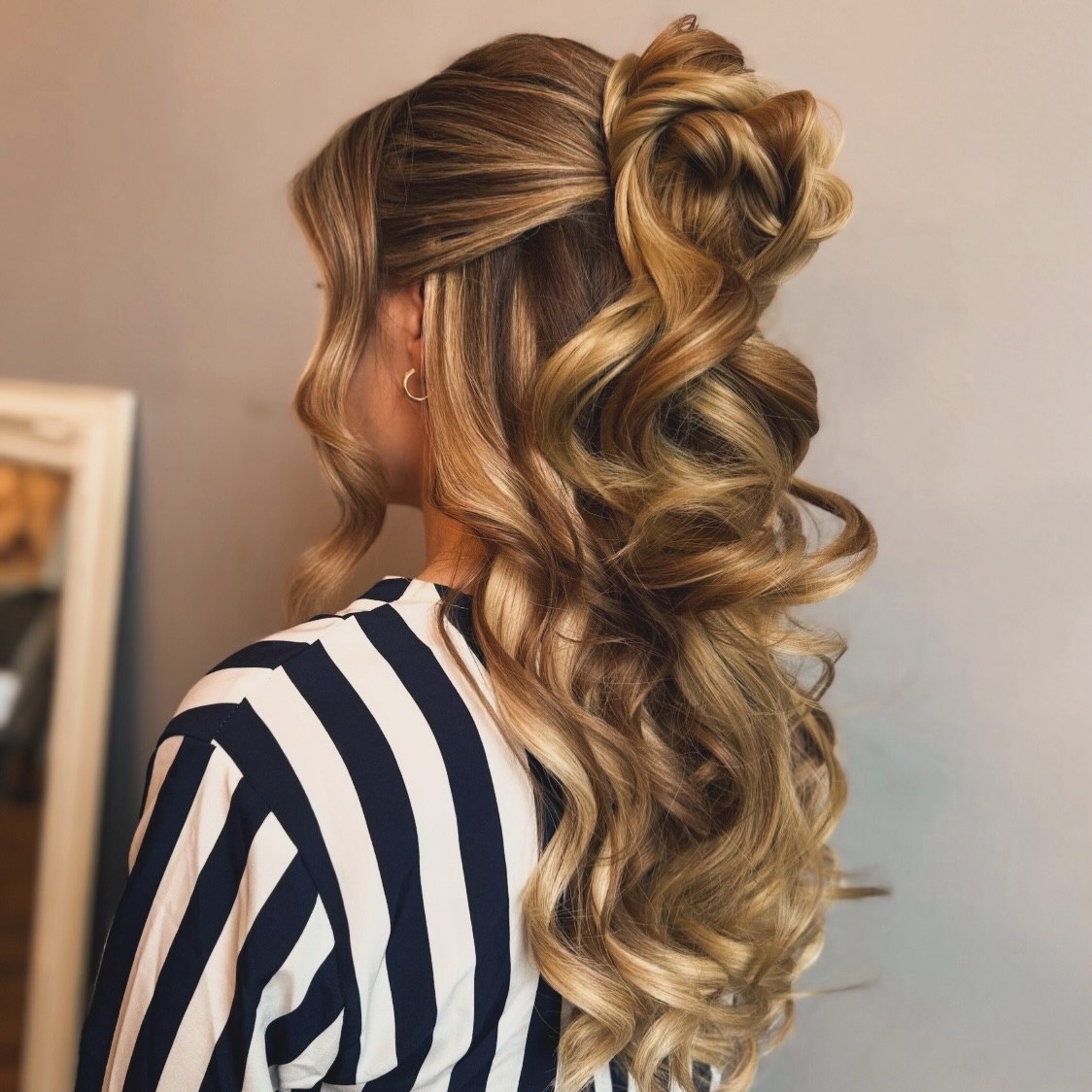 Elegant Twisted Half-Up Updo With Loose Curls