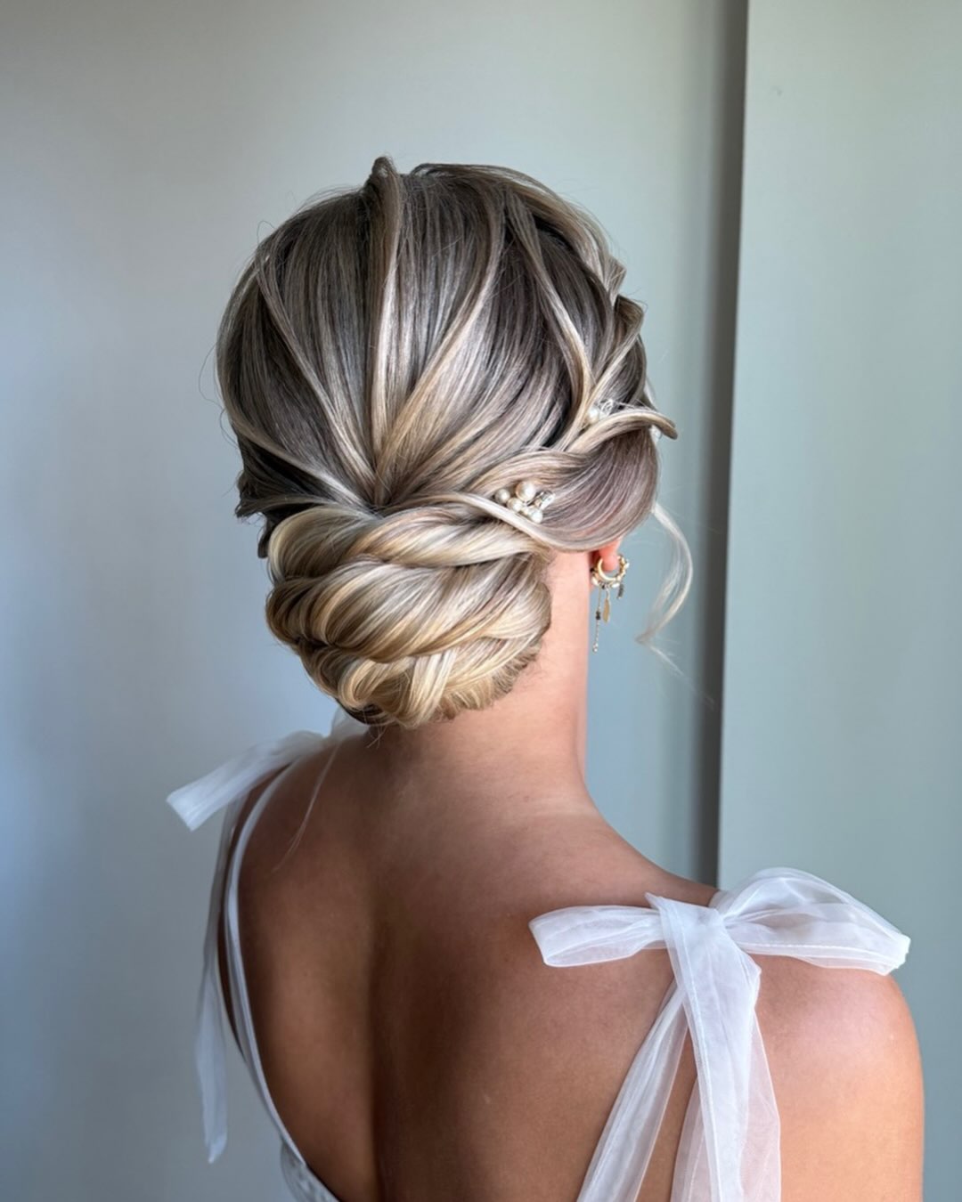 Elegant Twisted Low Updo With Pearls