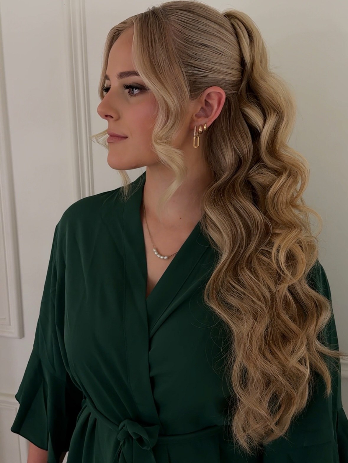 Glamorous High Ponytail With Cascading Hollywood Waves