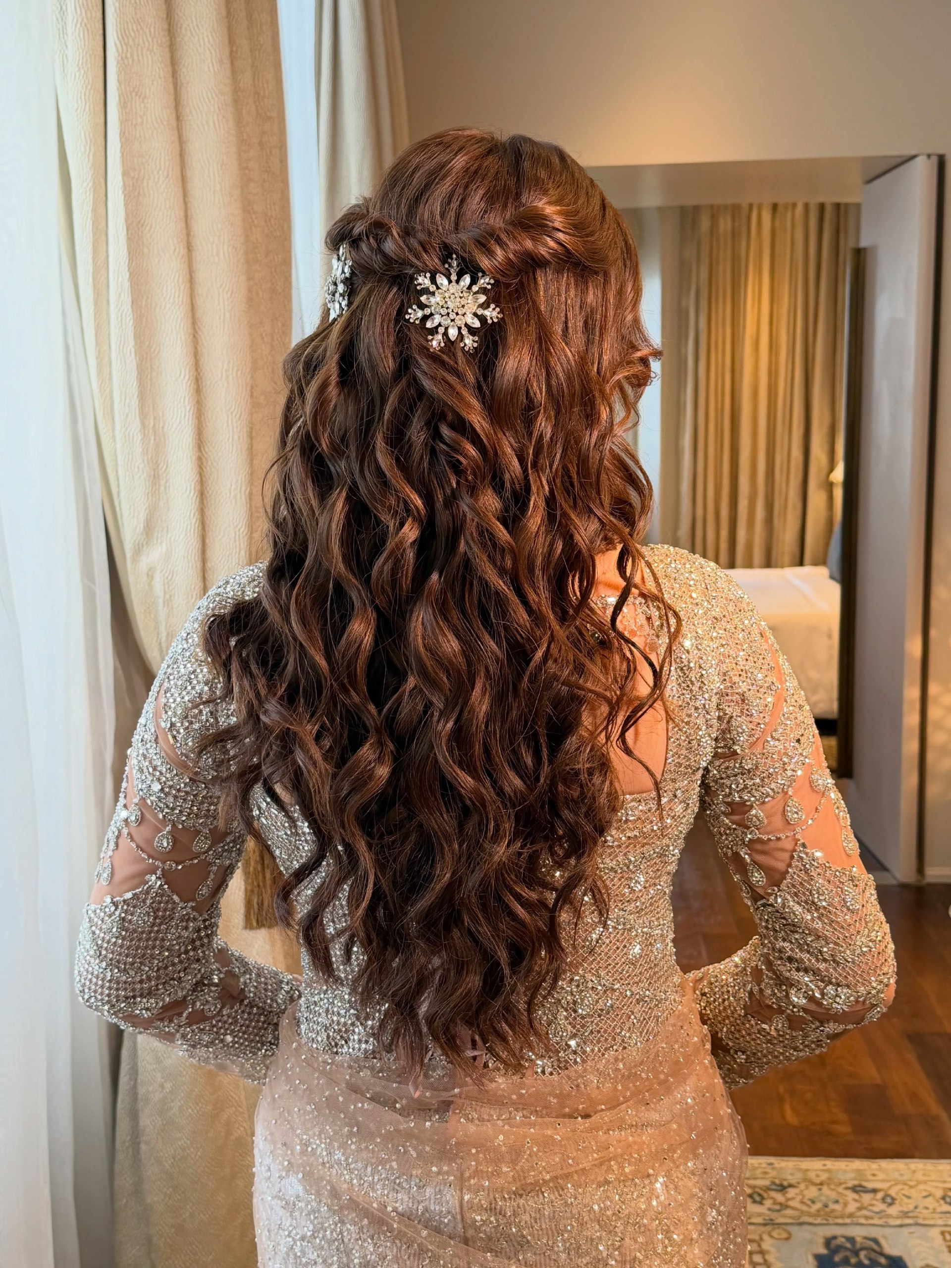 Glamorous Wavy Half-Up Style With Braids