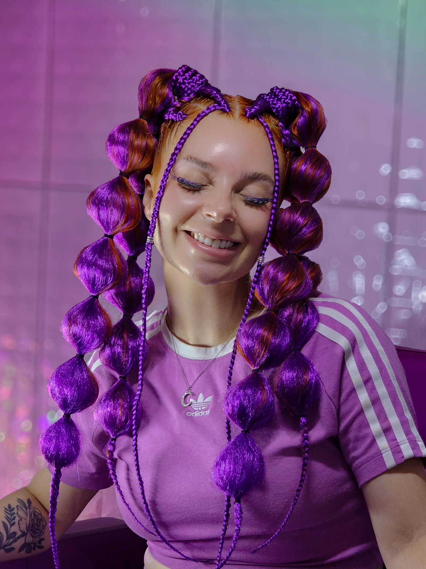 High Bubble Ponytails With Vibrant Purple Accents