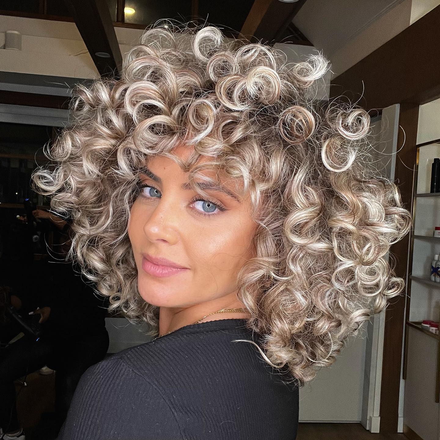 Honey Blonde Curls With Bright Blonde Highlights
