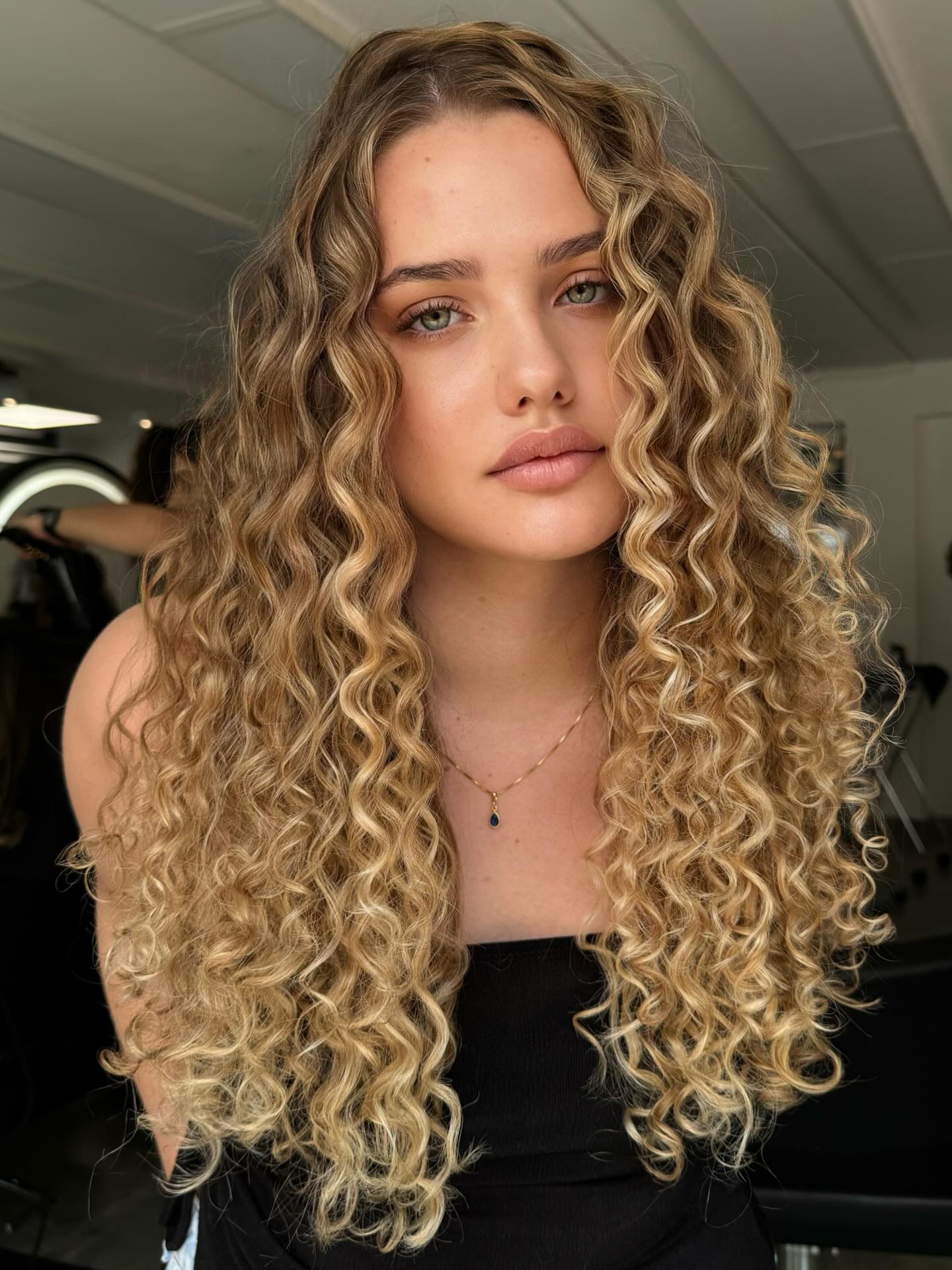Honey Blonde Curls With Face Framing Layers