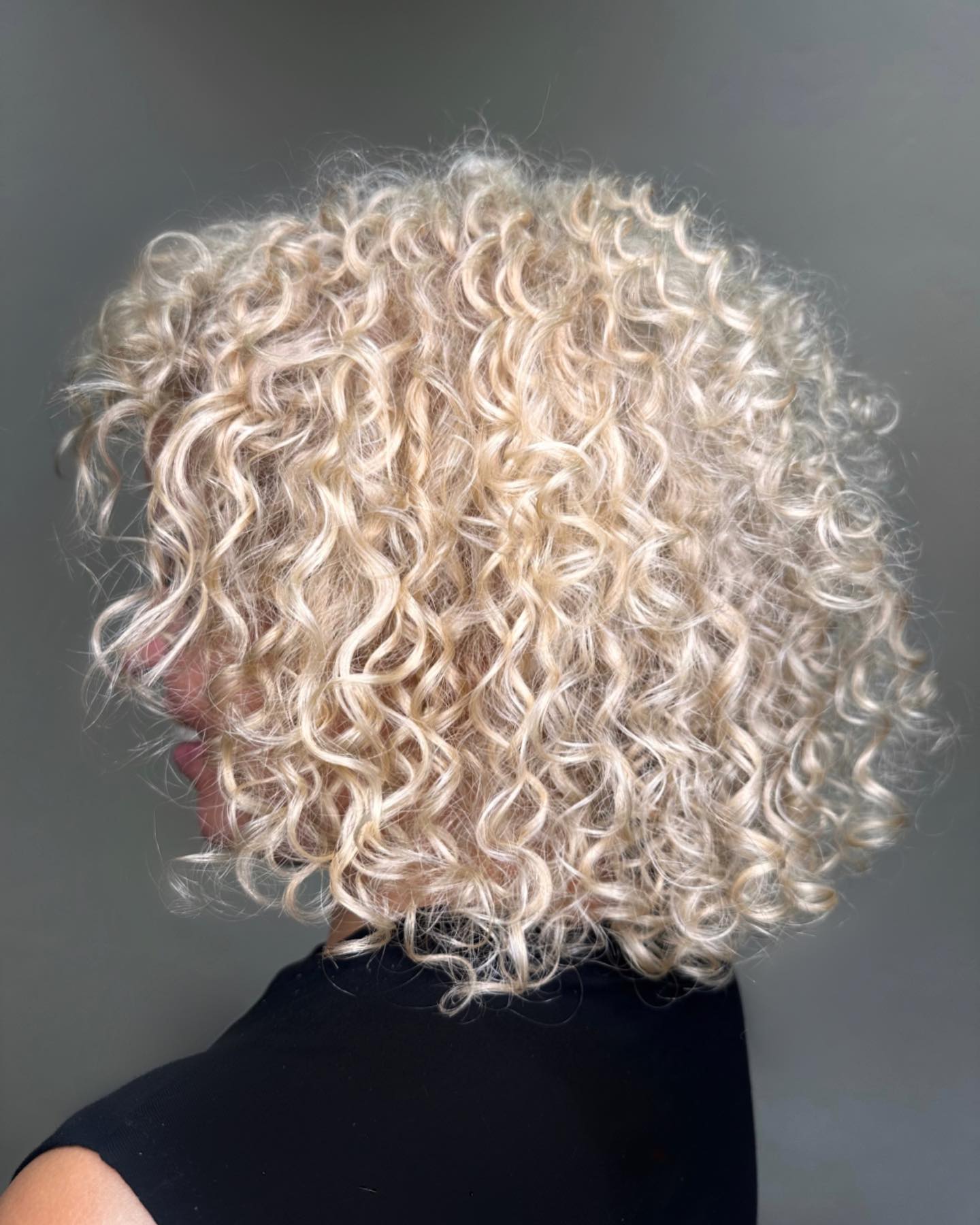 Honey Blonde Curly Bob With Defined Ringlets