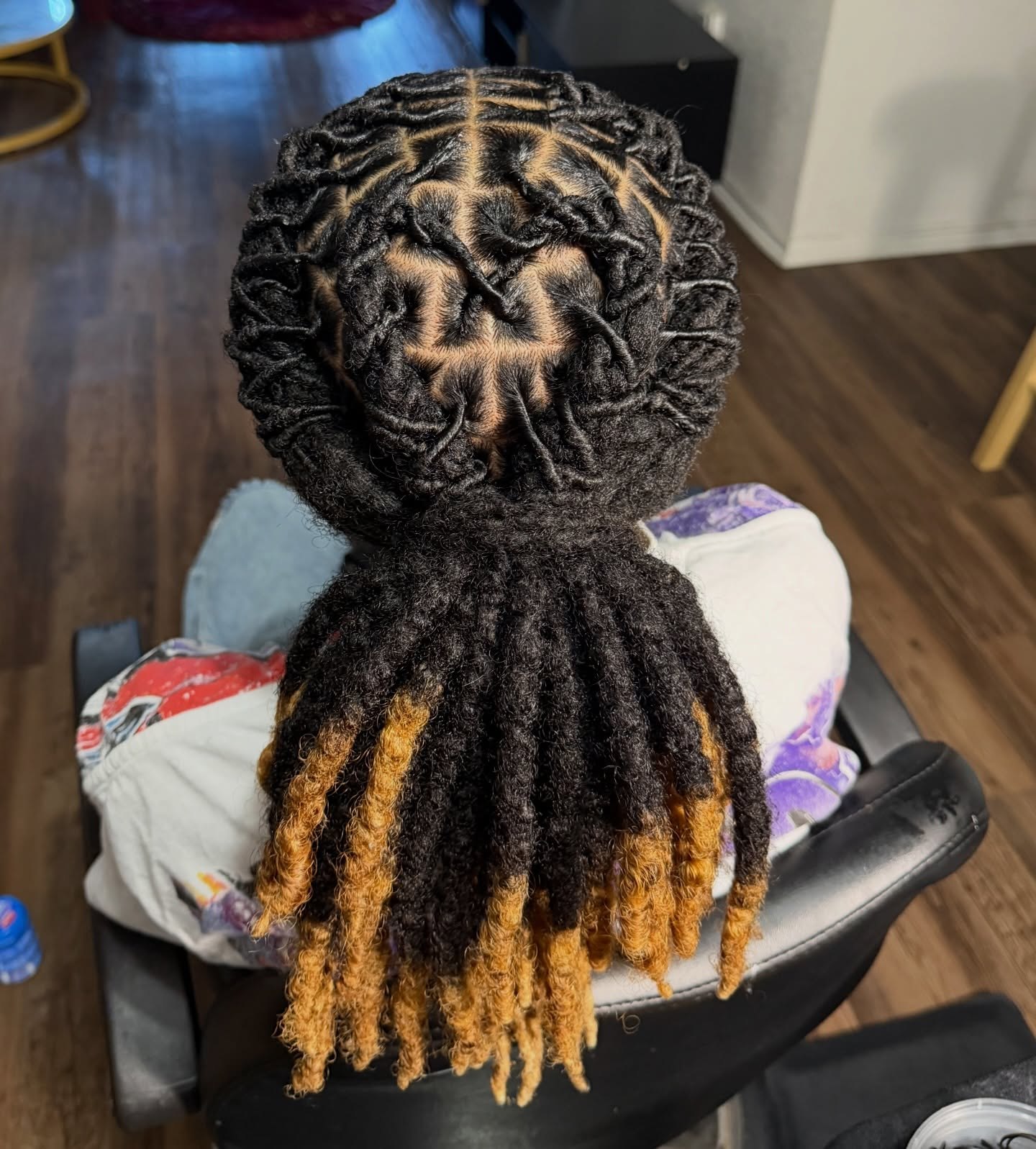 Intricate Geometric Barrel Twist Ponytail With Honey Highlights