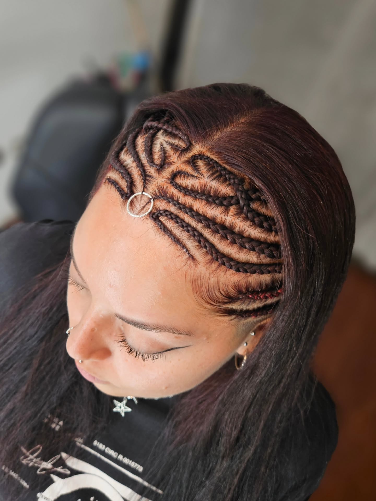Intricate Geometric Cornrows With Hair Ring Accent