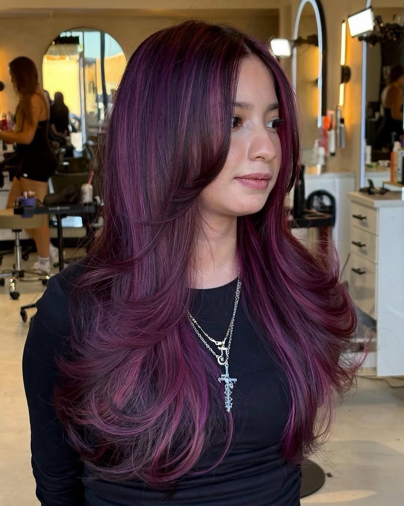 Layered Plum Hair With Face Framing Volume