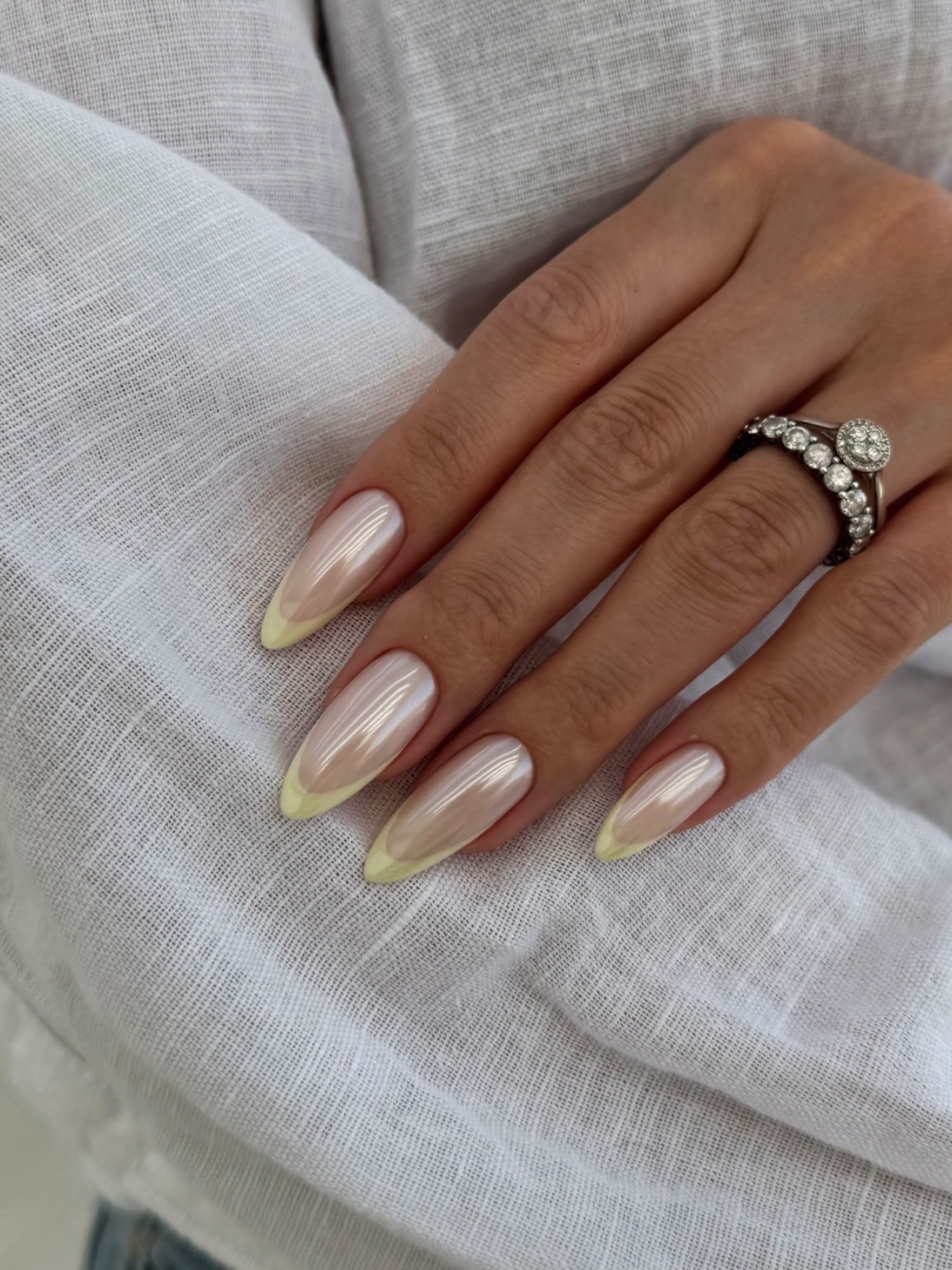 Pearlescent Almond French Tips with a Twist