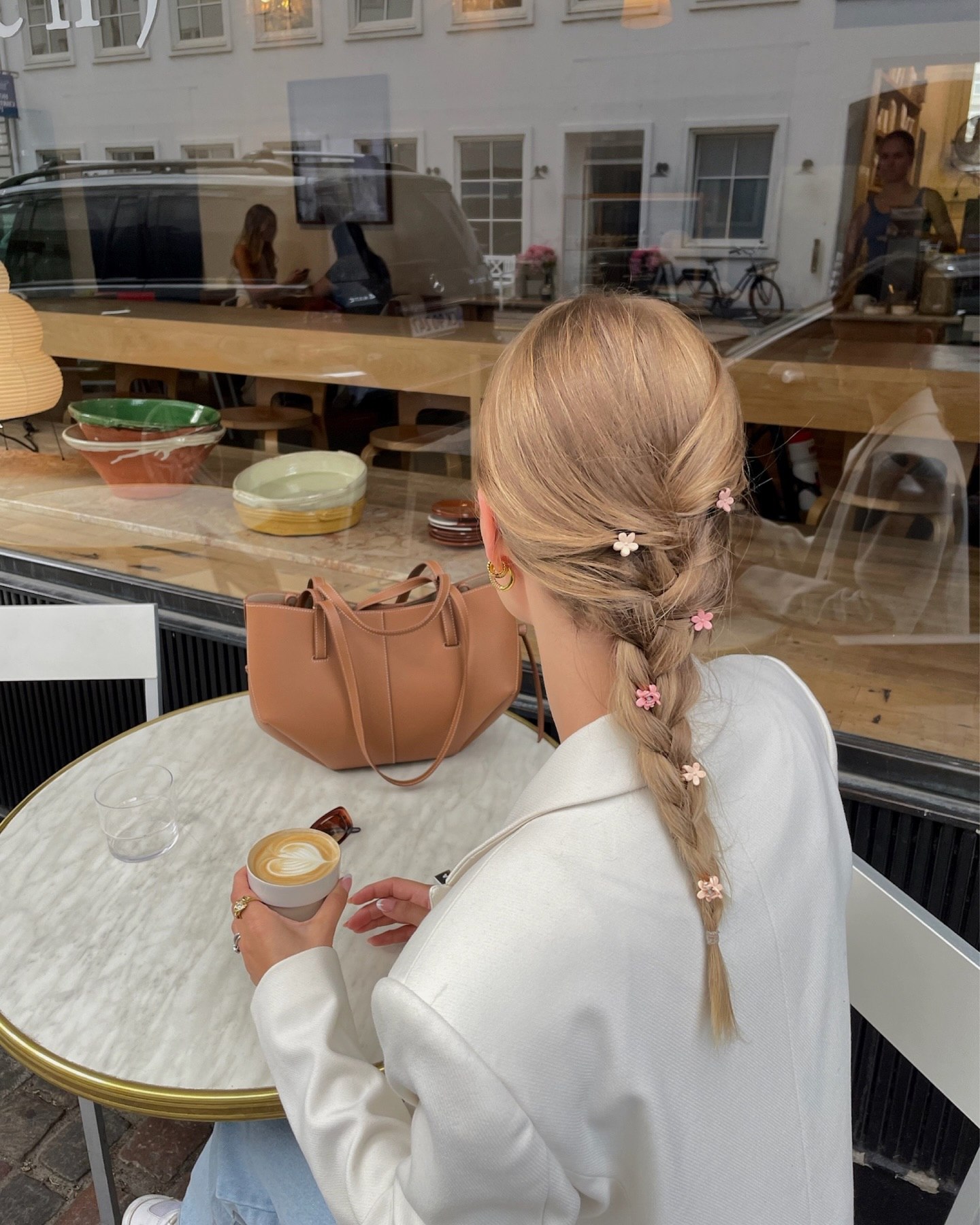 Playful Braided Ponytail With Flower Clips