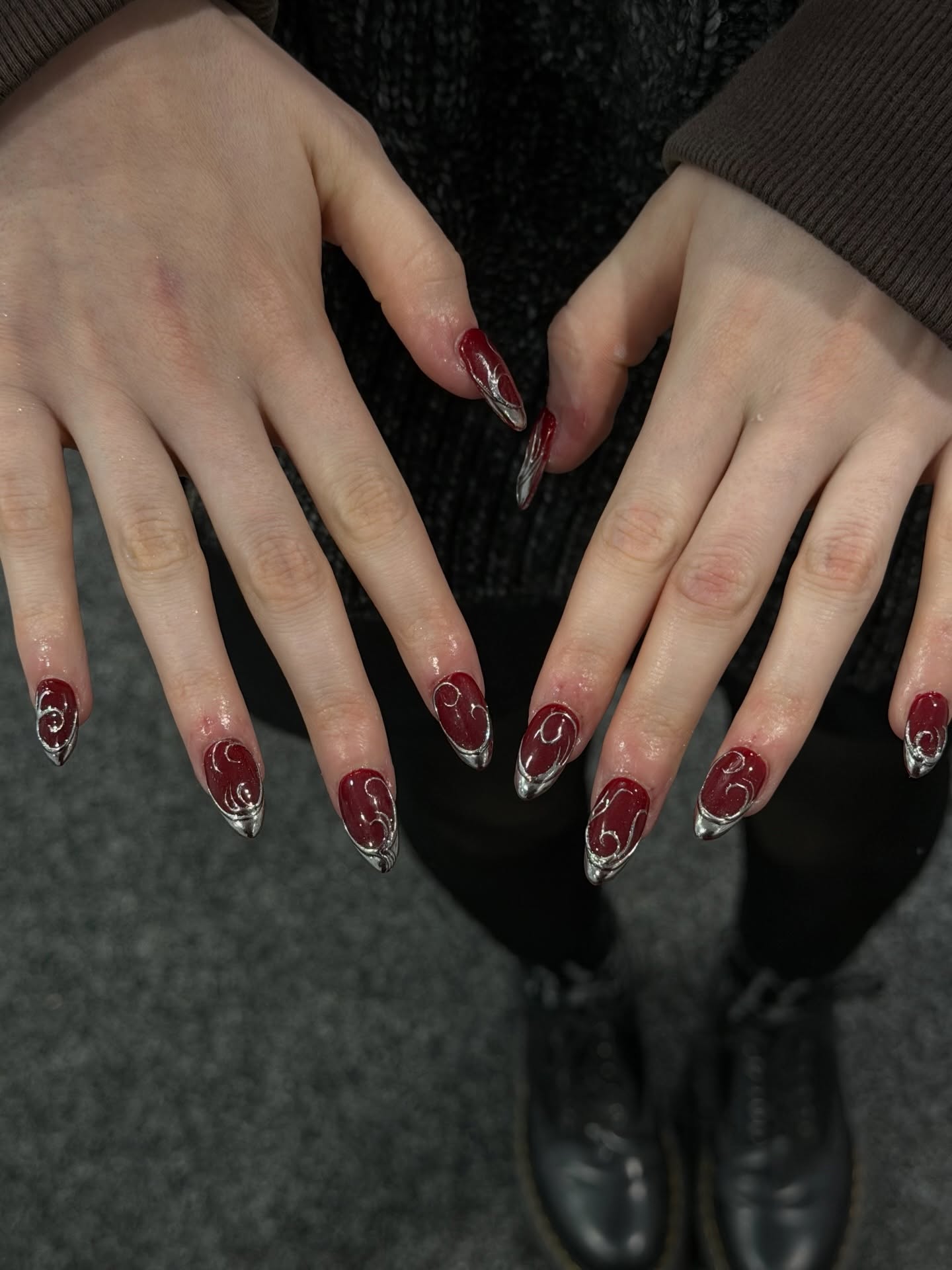 Rich Burgundy Chrome Swirl Almond Nails