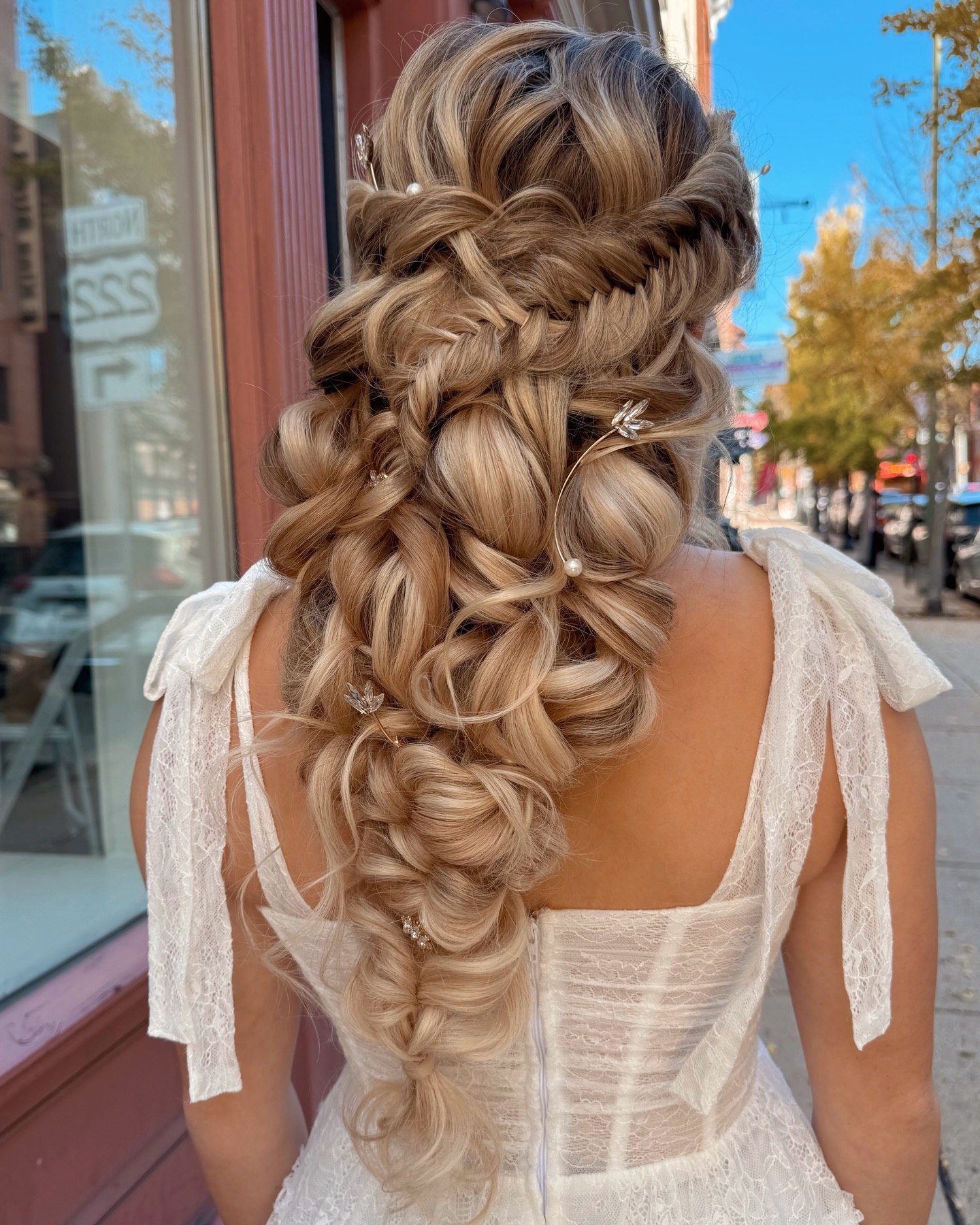 Romantic Braided Updo With Loose Curls