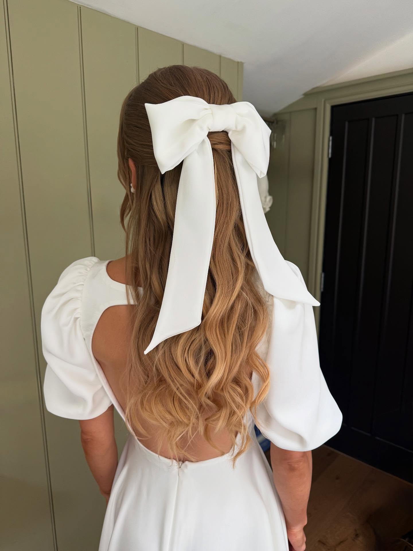 Romantic Half-Up Waves With Oversized Bow