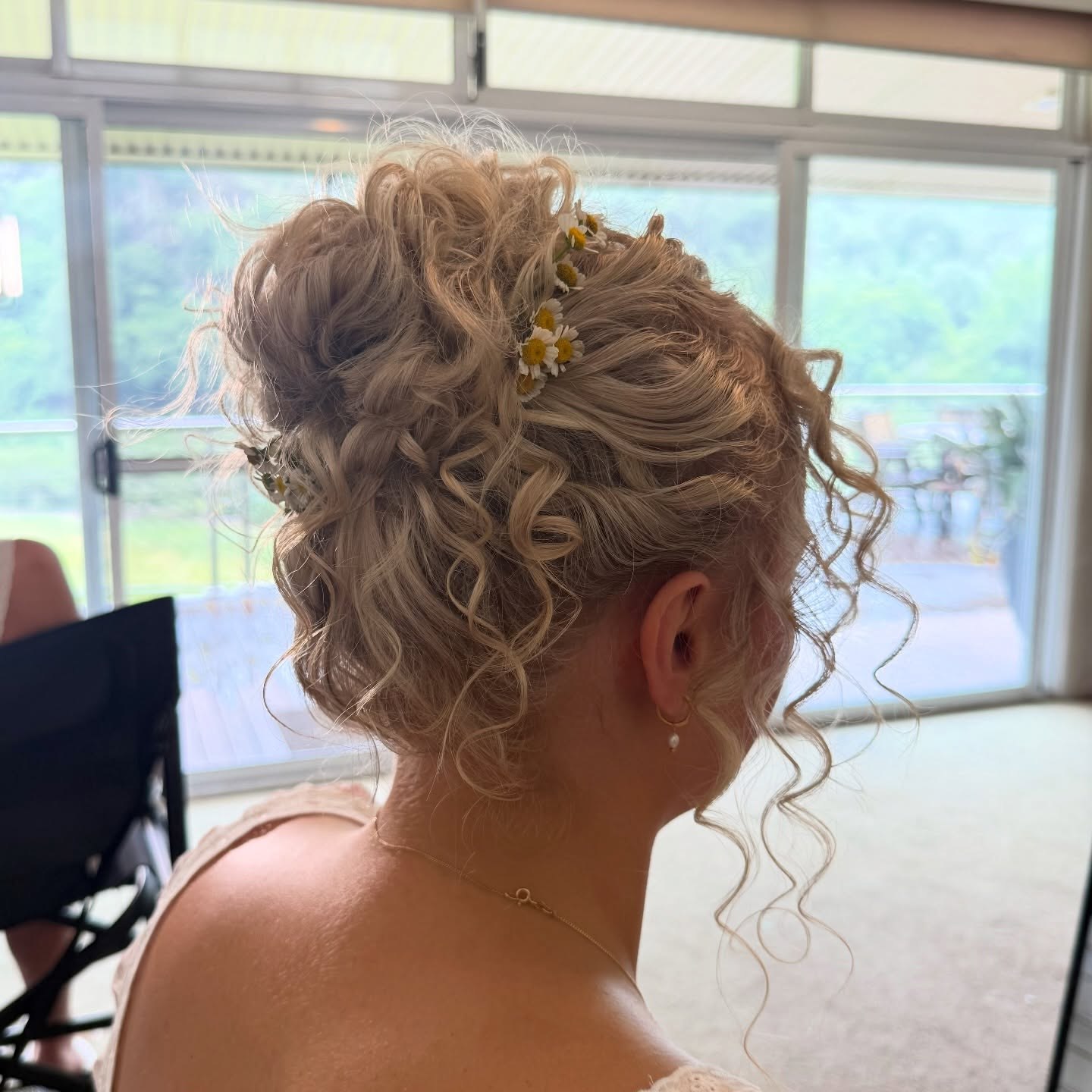 Romantic Messy Updo With Delicate Curls