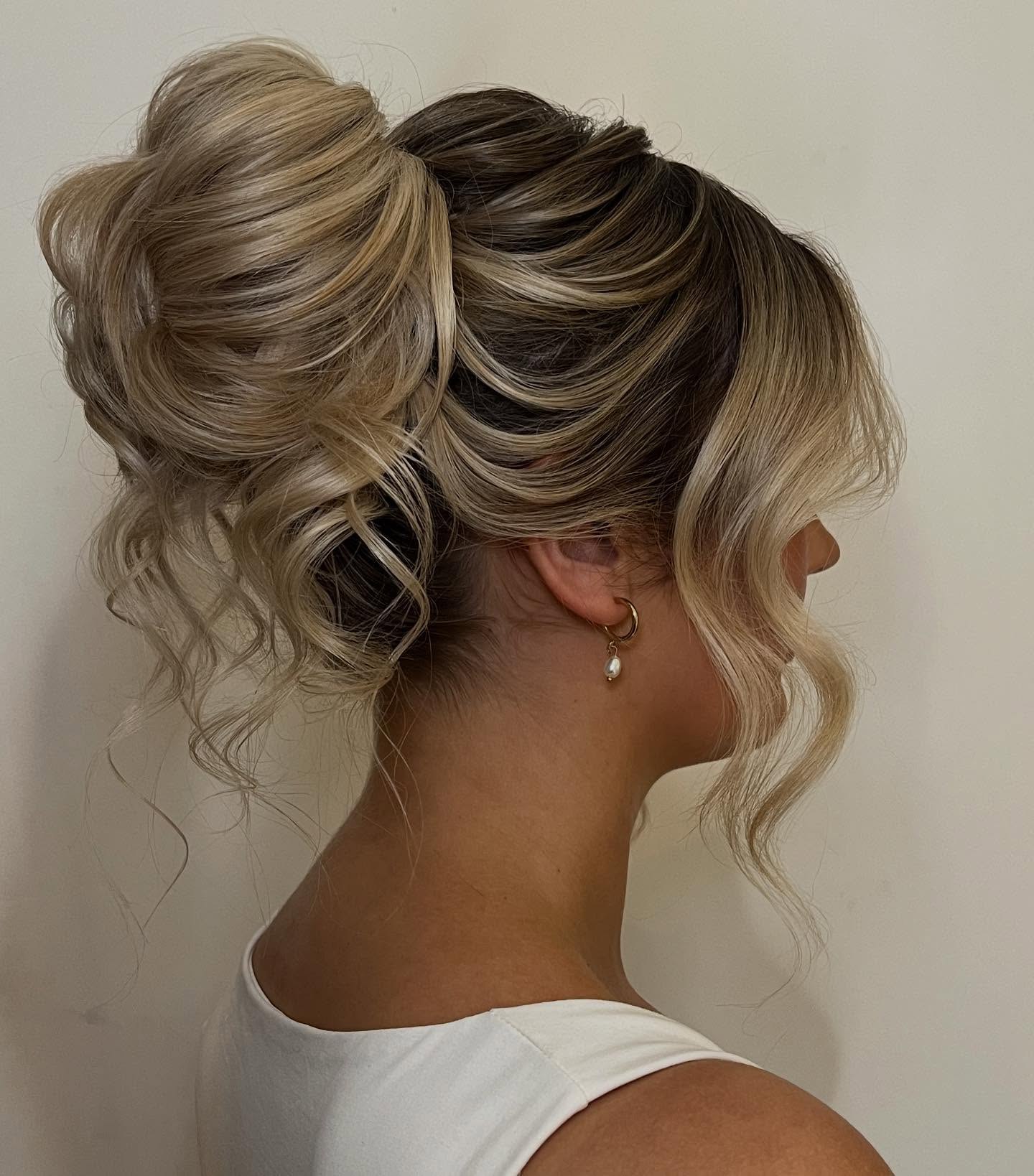 Romantic Twisted Updo With Loose Curls