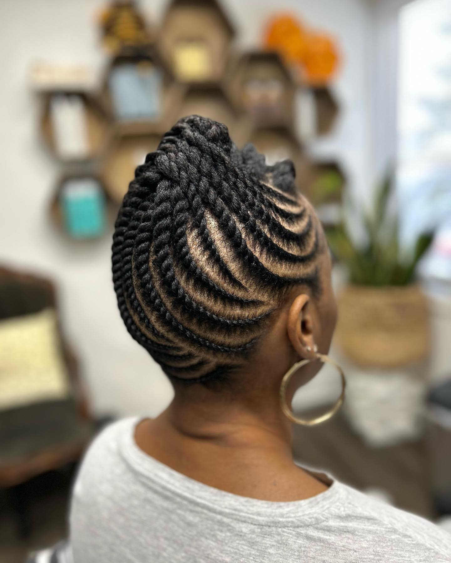 Sculptural Flat Twist Updo With Defined Parts