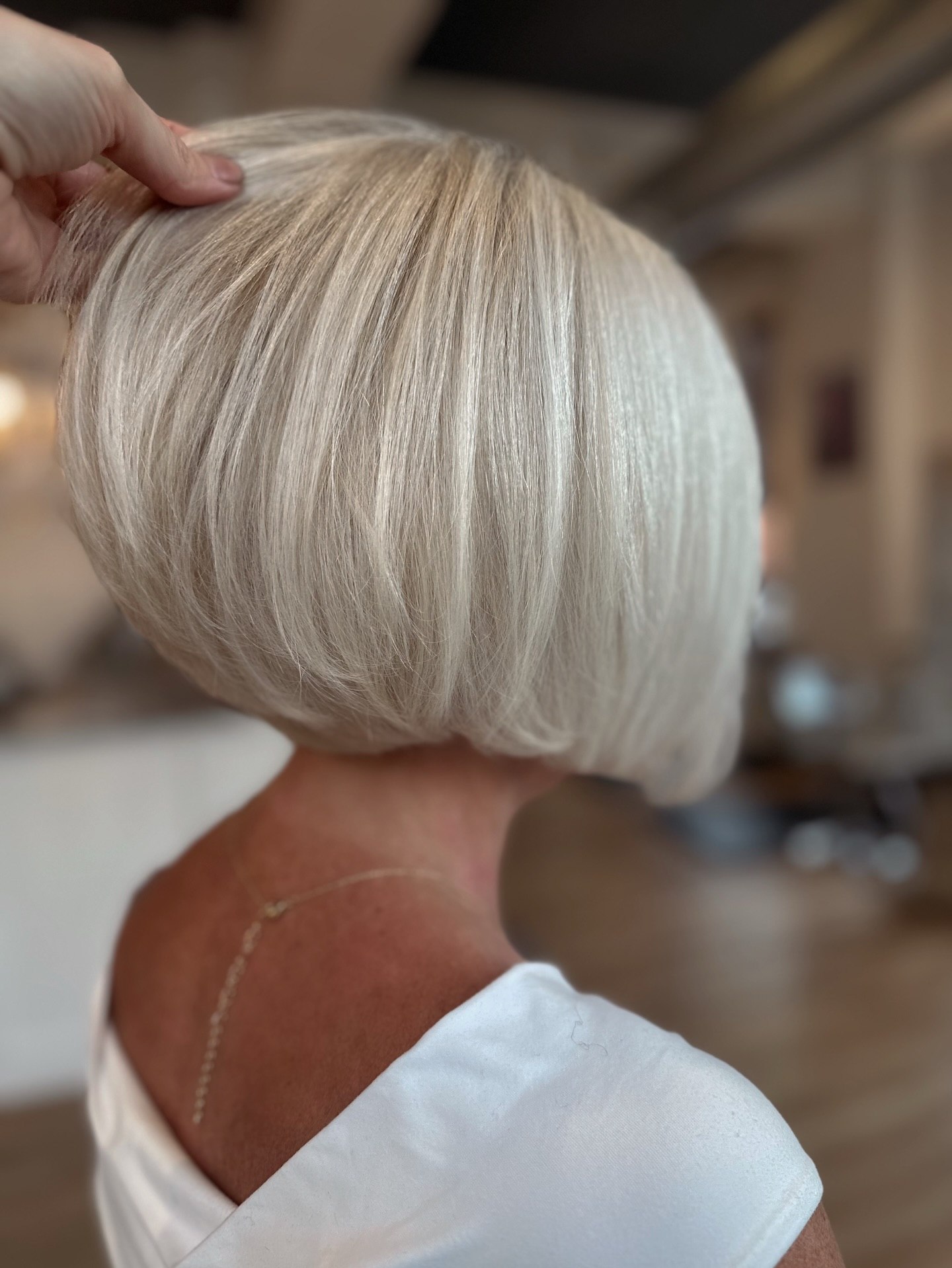Seamless Platinum Blonde Bob With Subtle Layers