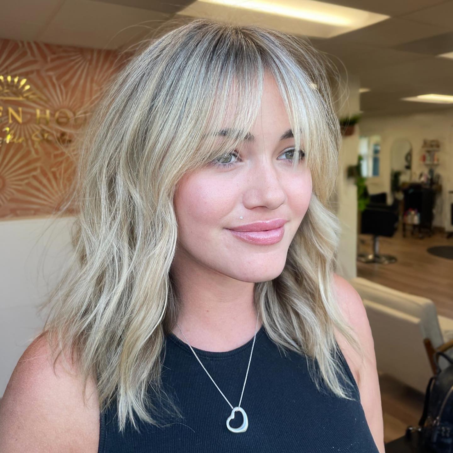 Shaggy Blonde Lob With Piecey Curtain Bangs
