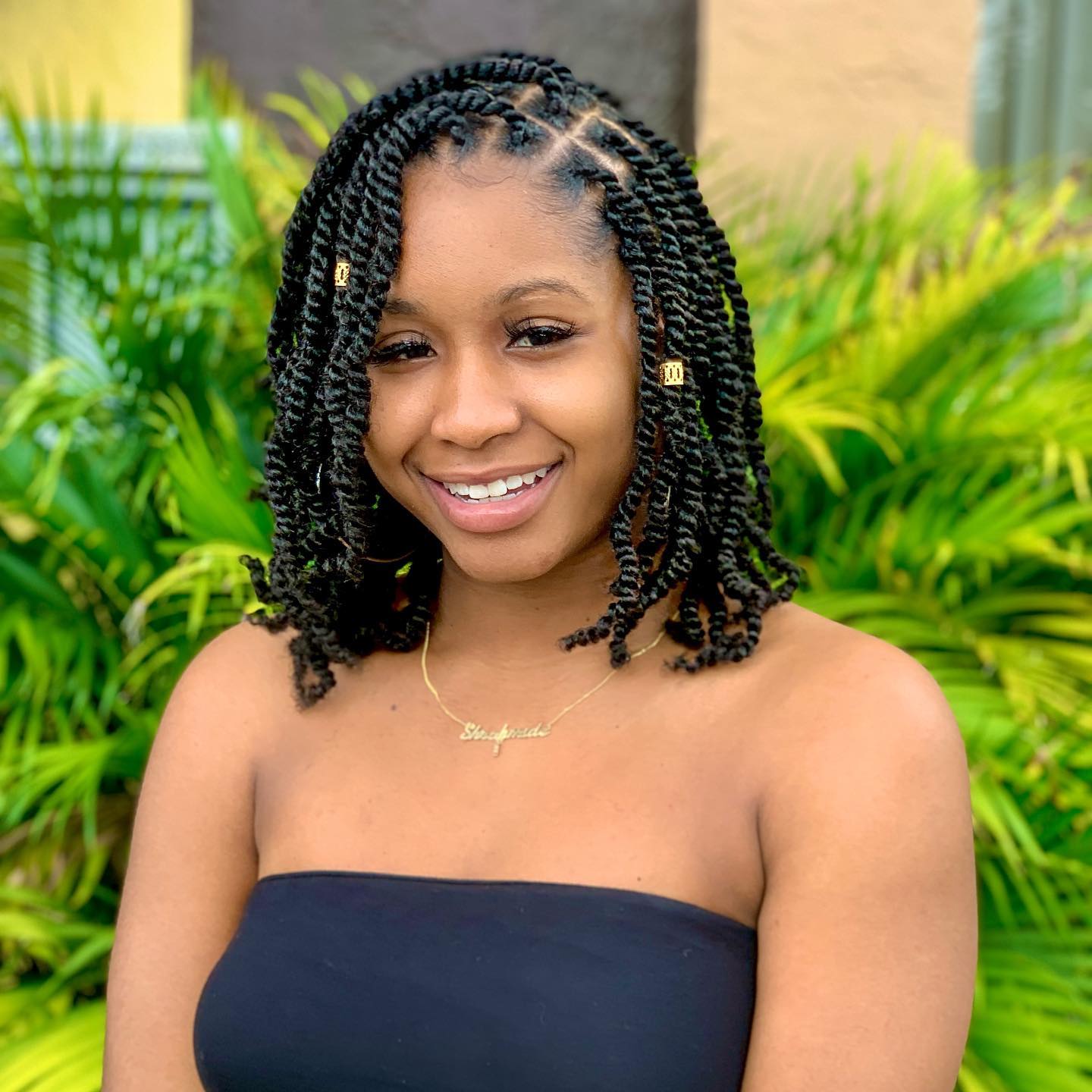 Shoulder Length Kinky Twists With Gold Cuffs