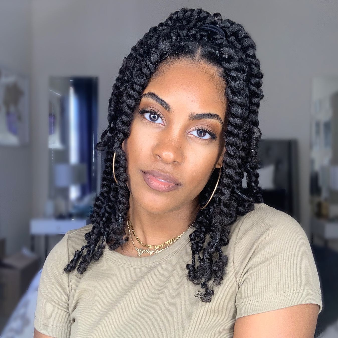 Shoulder Length Kinky Twists With Half Up Style