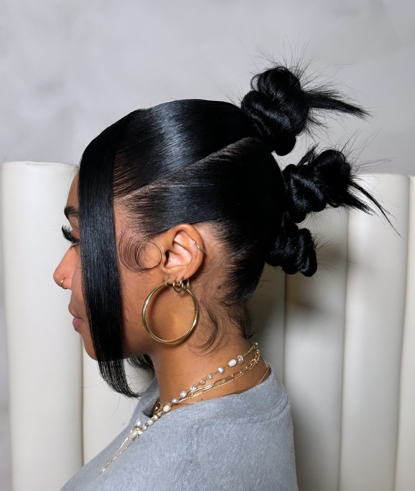 Sleek Bantu Knots With Face-Framing Pieces
