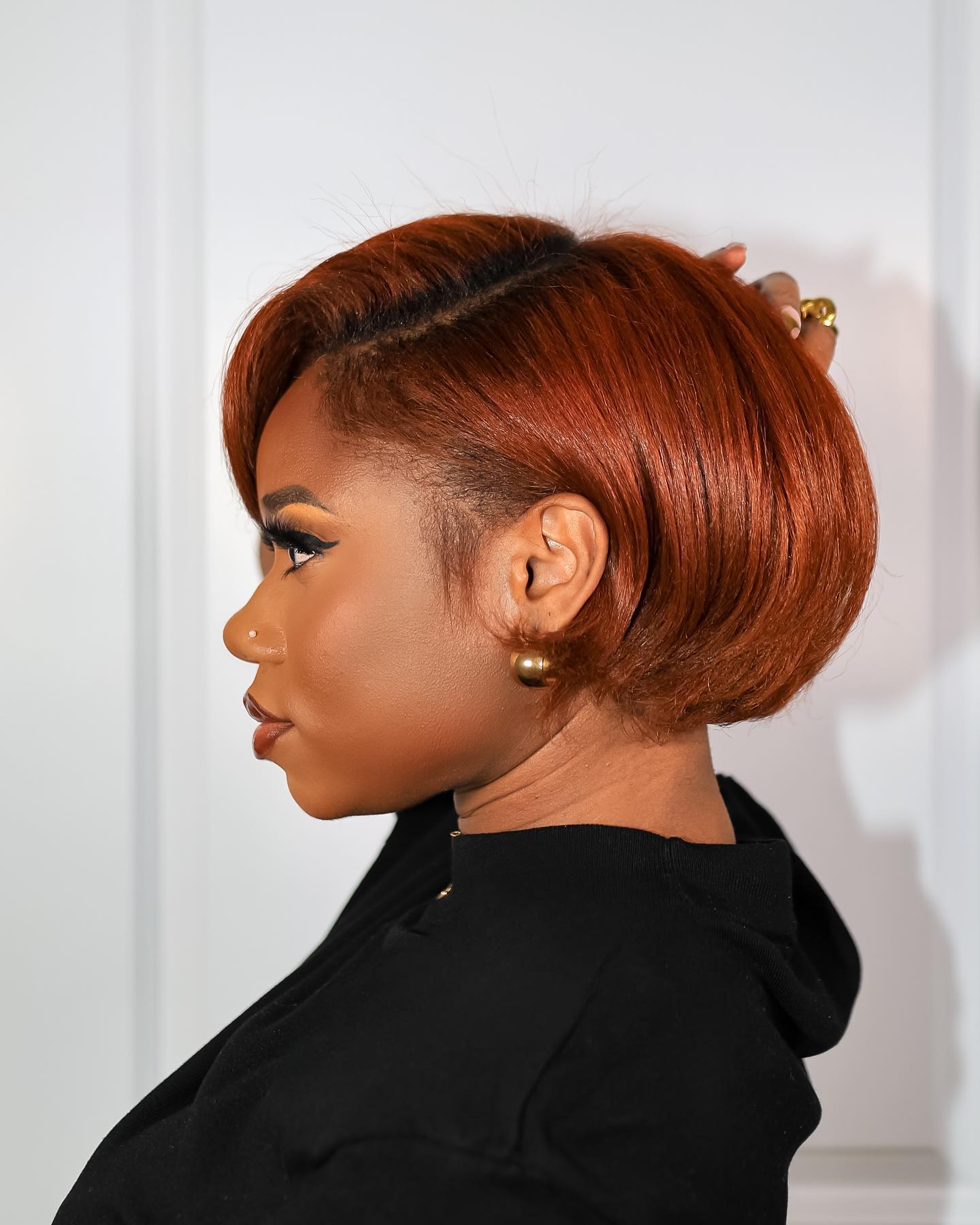 Sleek Copper Bob With Subtle Face-Framing Layers