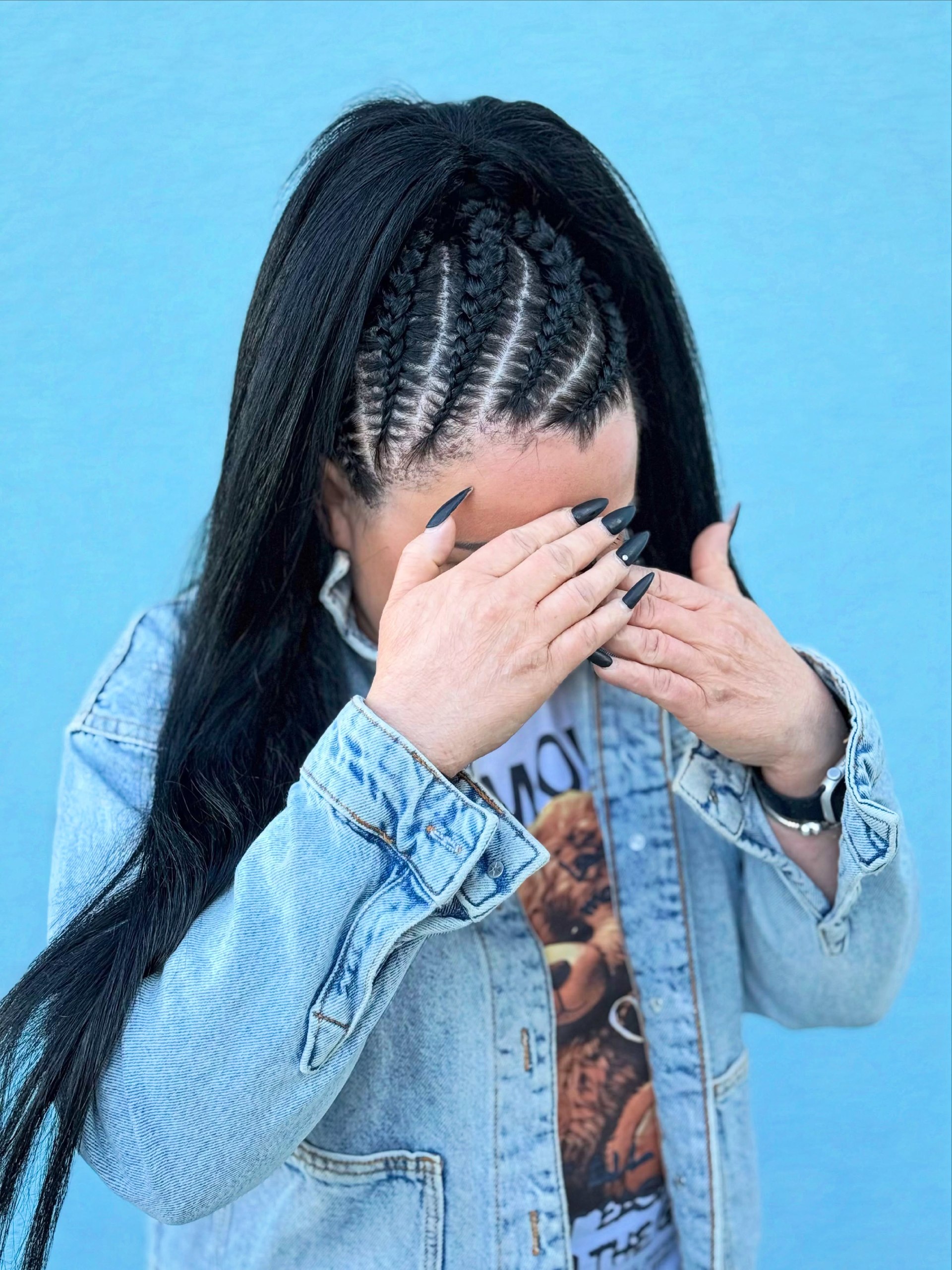 Sleek Cornrow Ponytail With Flowing Waves