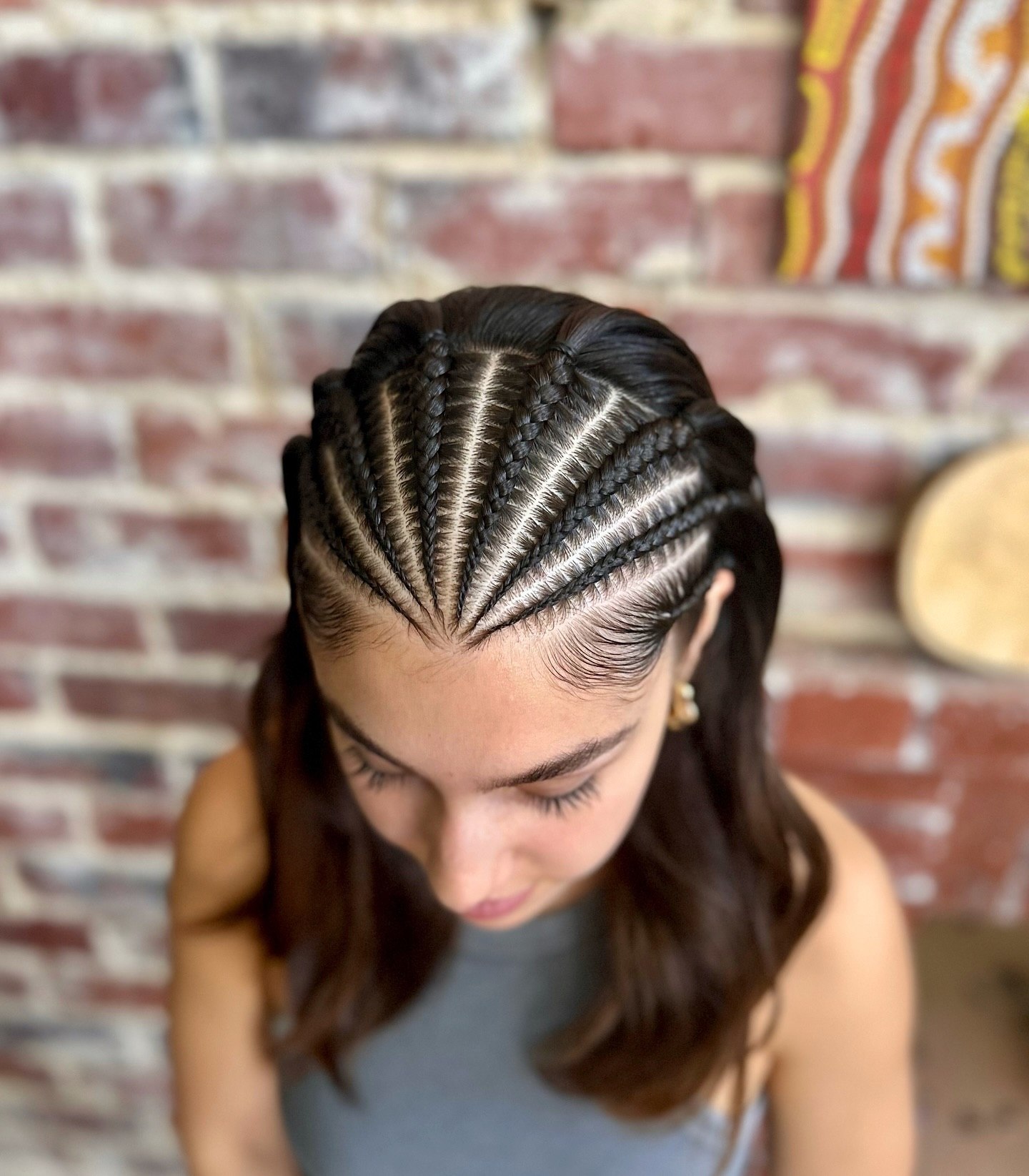 Sleek Cornrows With Defined Partings