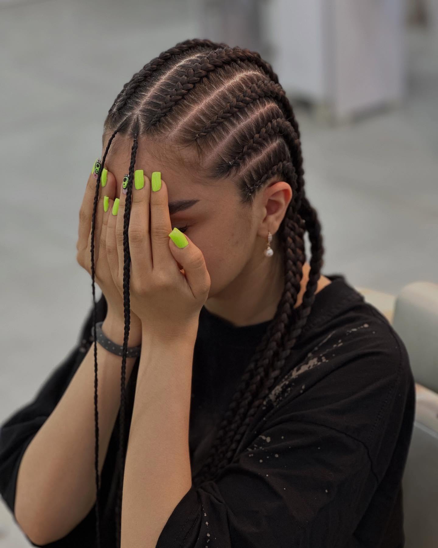 Sleek Fulani Braids With Deep Part