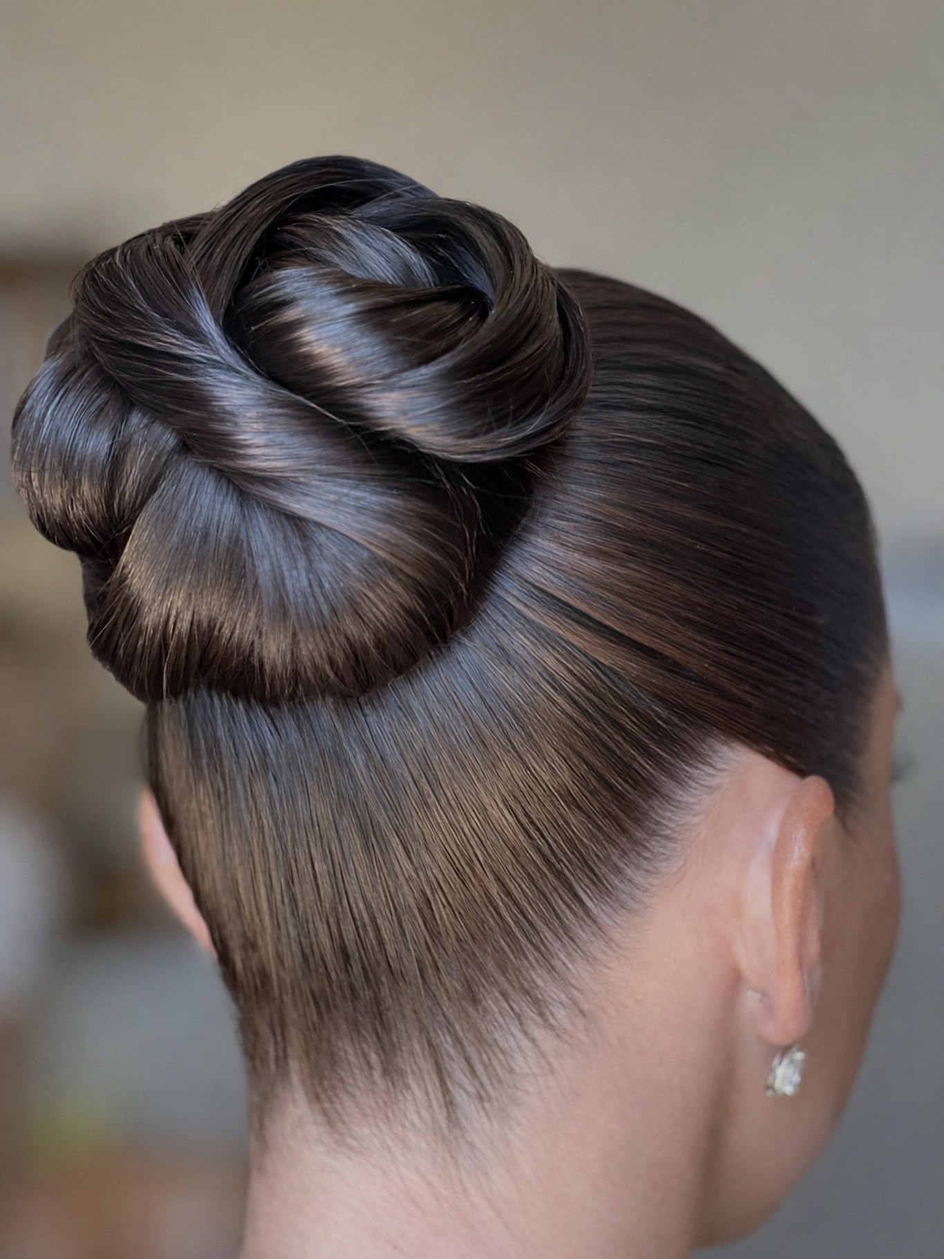 Sleek Sculpted Rose Bun Hairstyle
