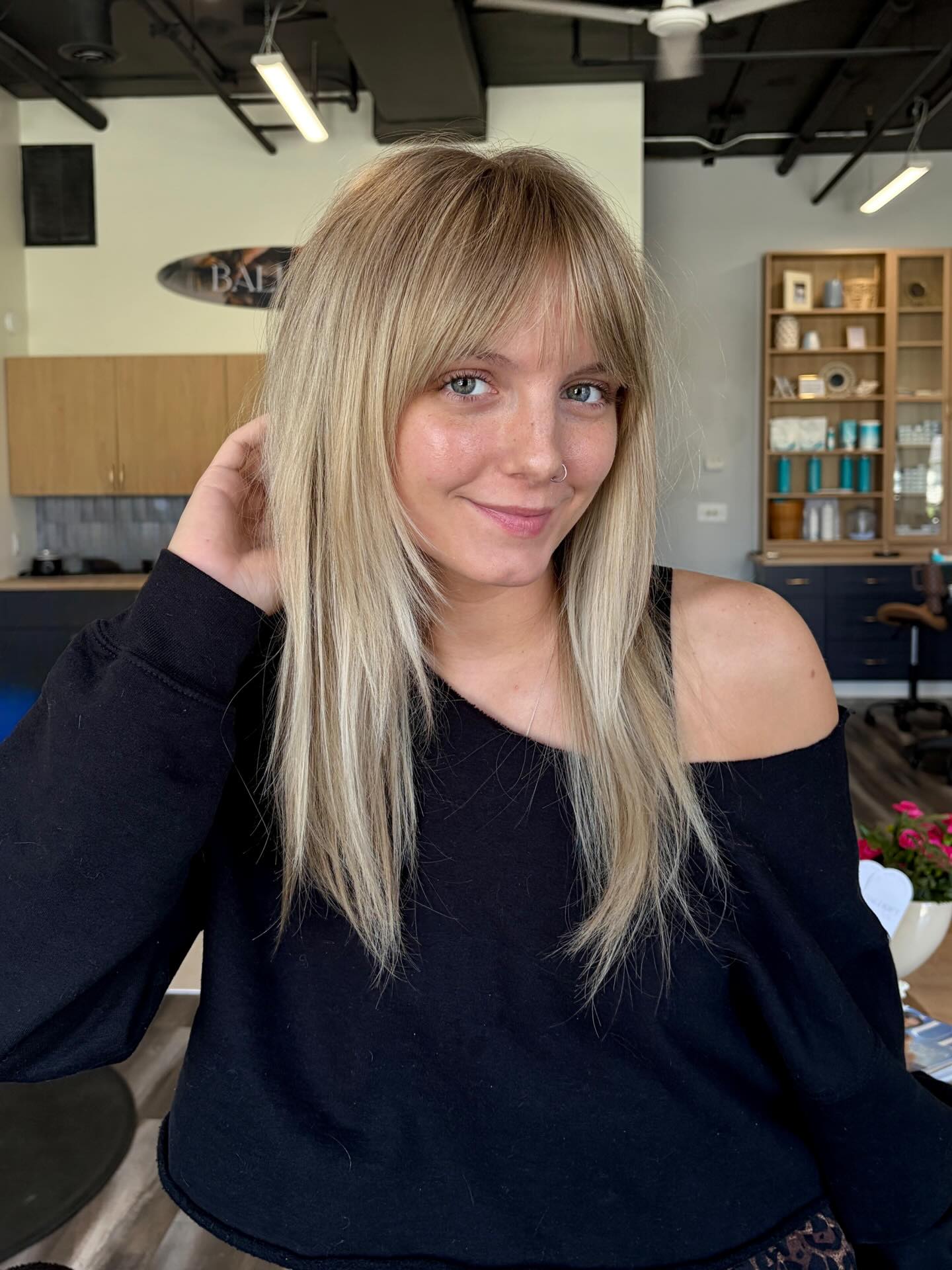 Soft Blonde Curtain Bangs With Layered Waves