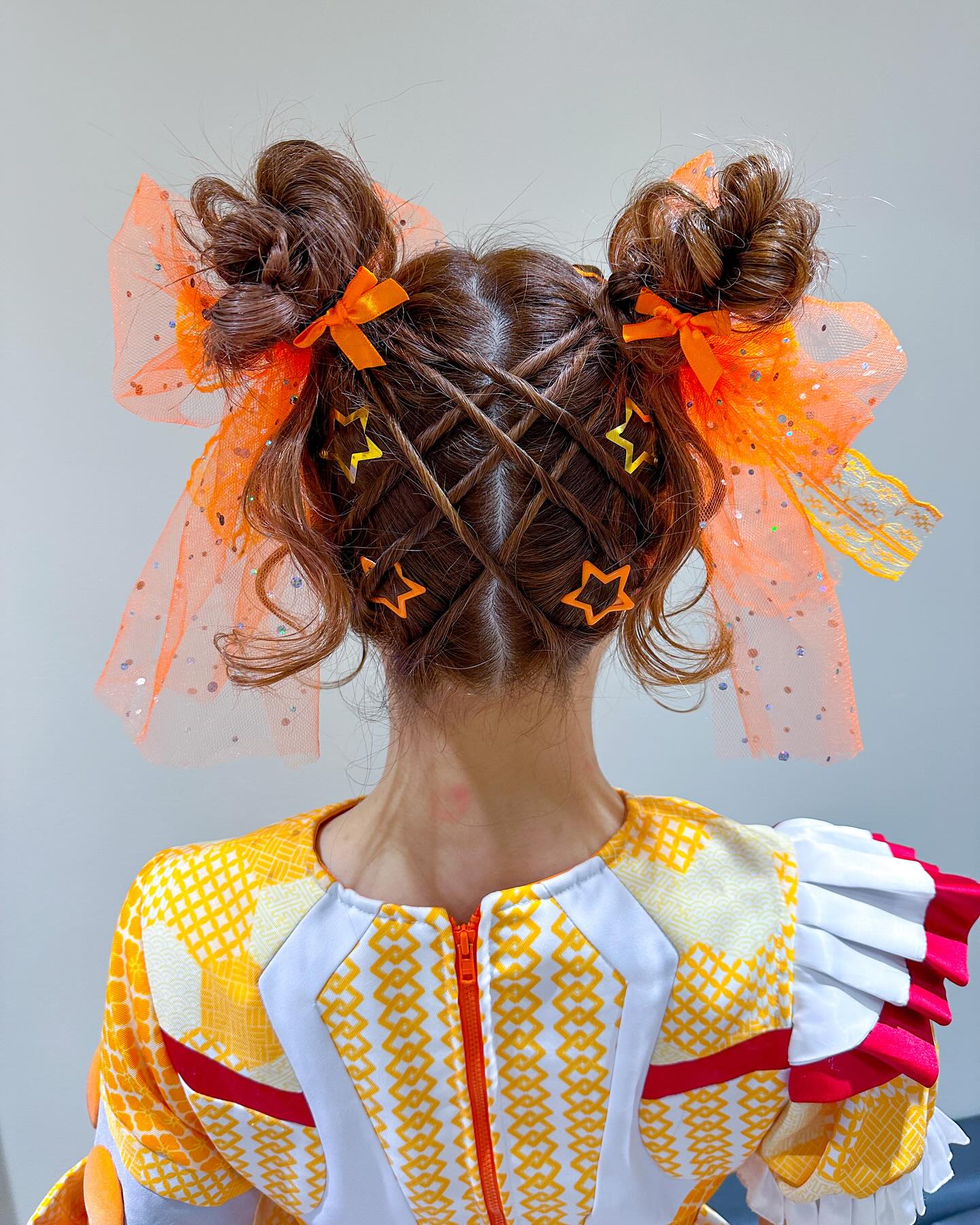 Starry Space Buns With Orange Tulle Accents
