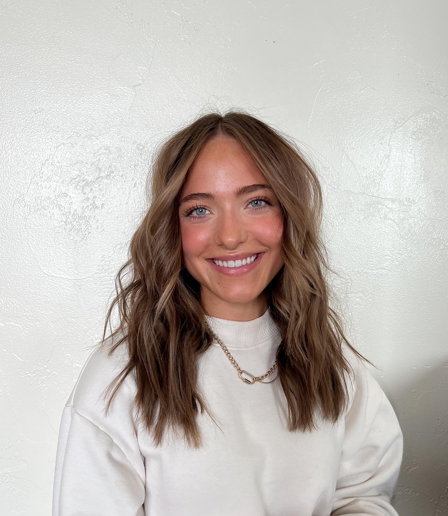 Textured Mid Length Layers With Face Framing