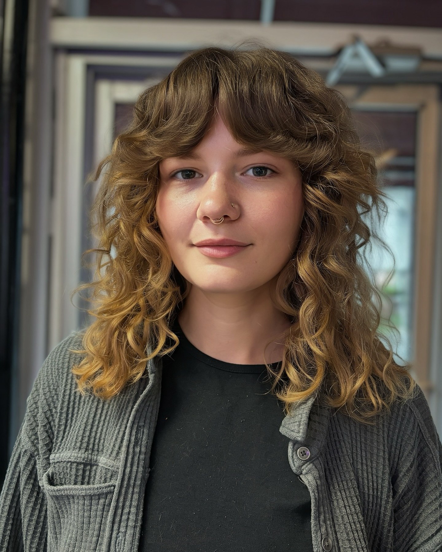 Textured Shag With Curtain Bangs On Mid Length Hair