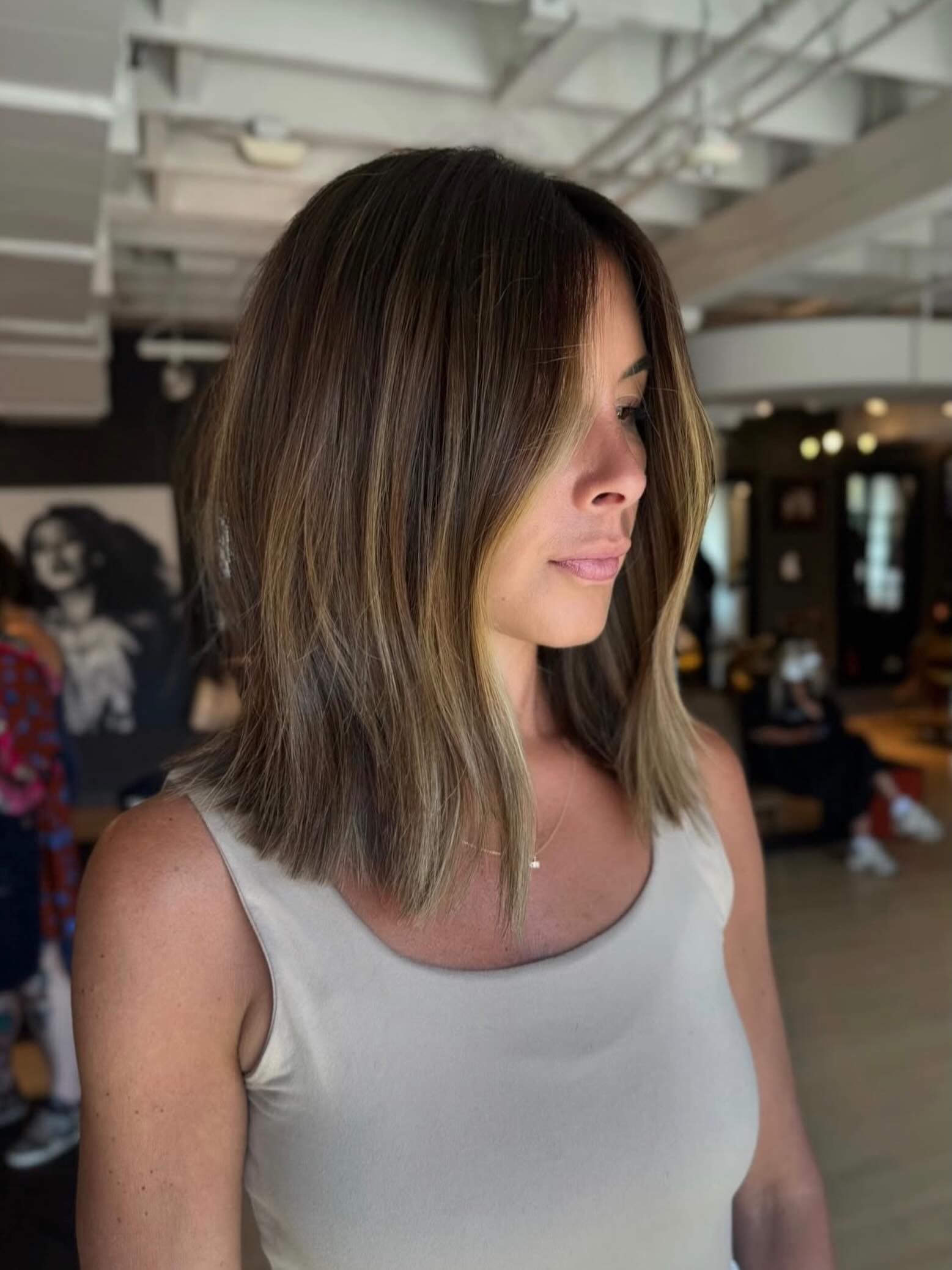 Textured Shoulder Length Lob With Face Framing Highlights