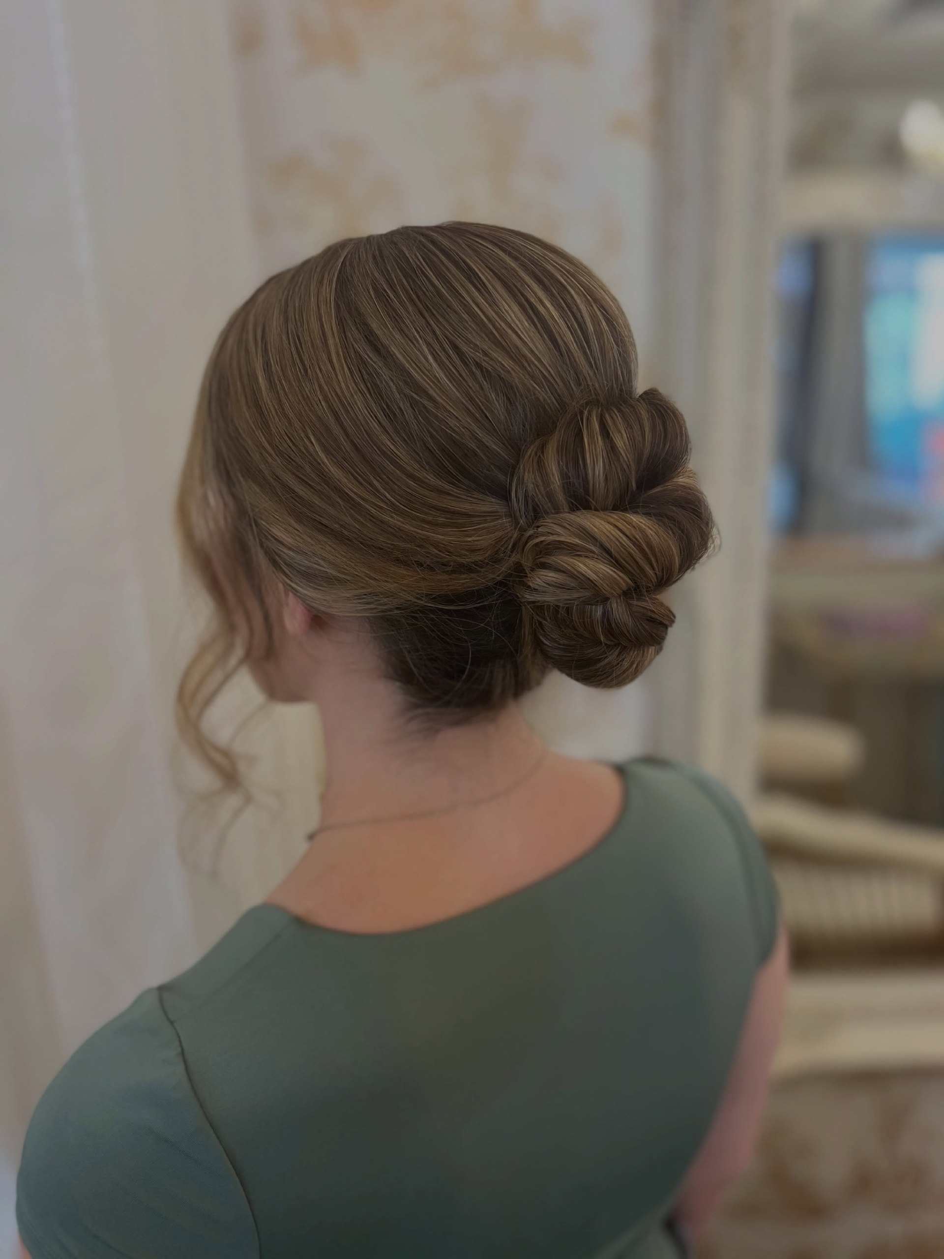 Twisted Chignon With Loose Face-Framing Strands