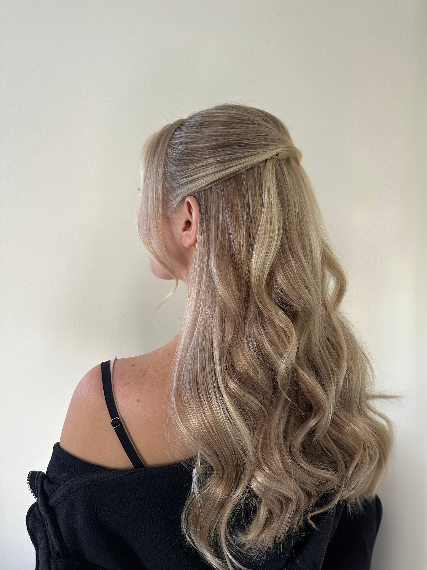 Twisted Half-Up Style With Loose Waves