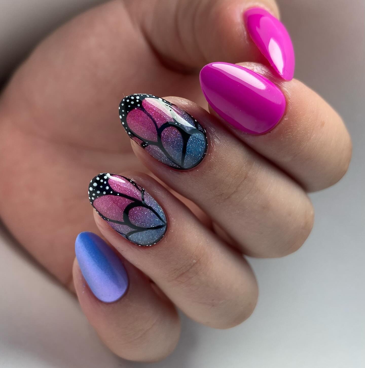 Vibrant Butterfly Wings Almond Nails