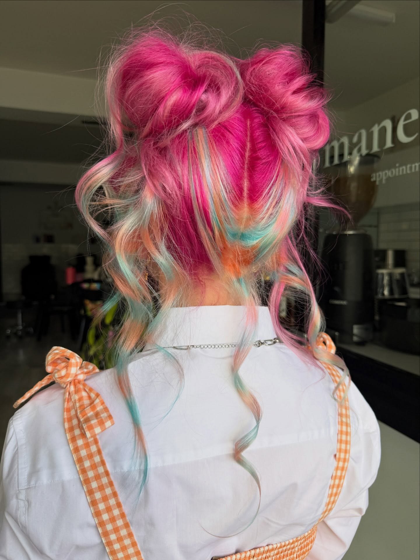 Vibrant Pink Space Buns With Pastel Undertoners