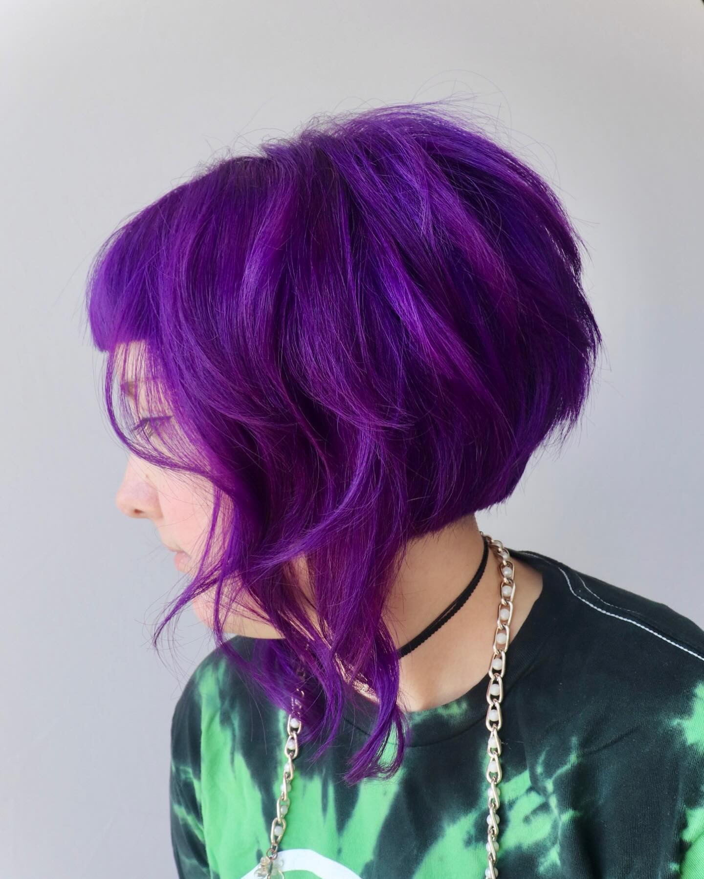 Vibrant Violet Shag With Blunt Bangs