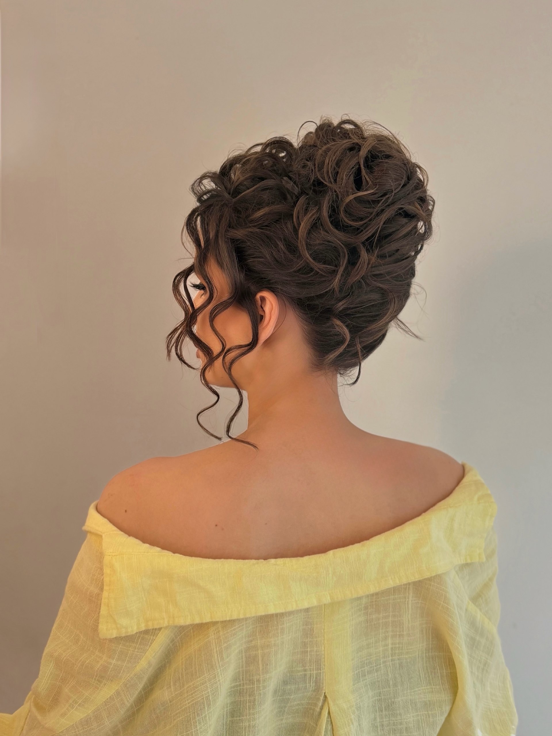 Voluminous Elegant Updo With Cascading Curls