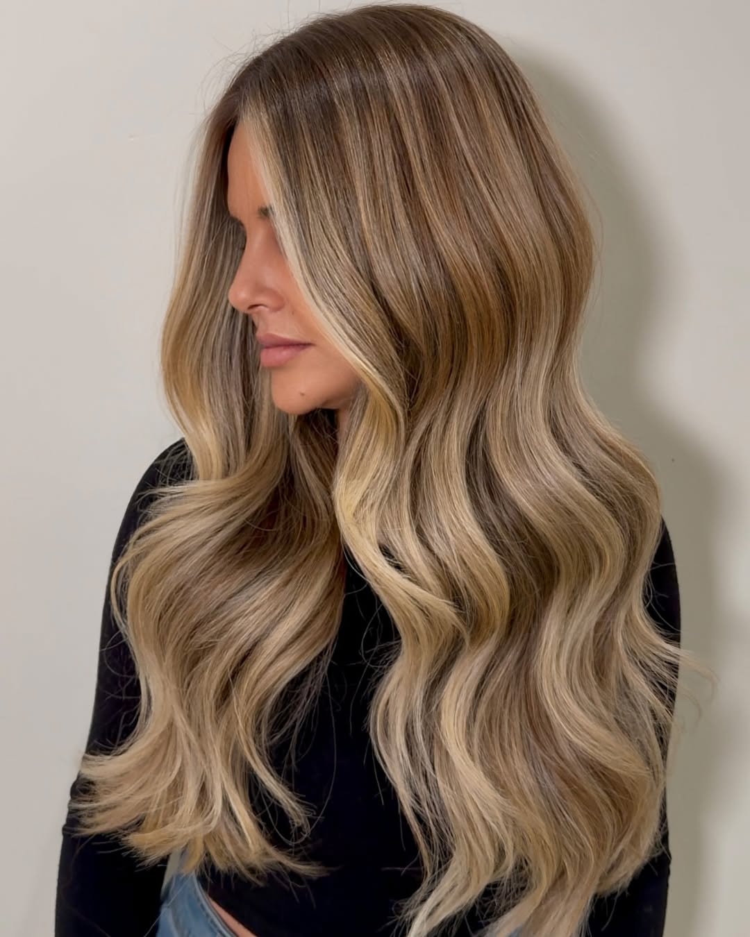 Warm Honey Blonde Balayage With Soft Beach Waves