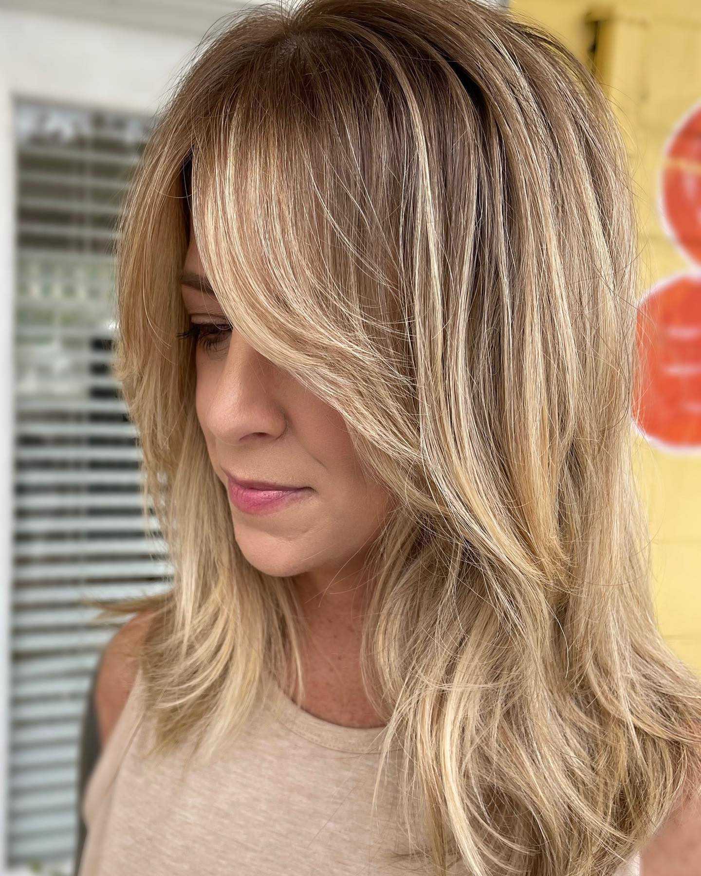 Wispy Curtain Bangs With Bronde Balayage Lob