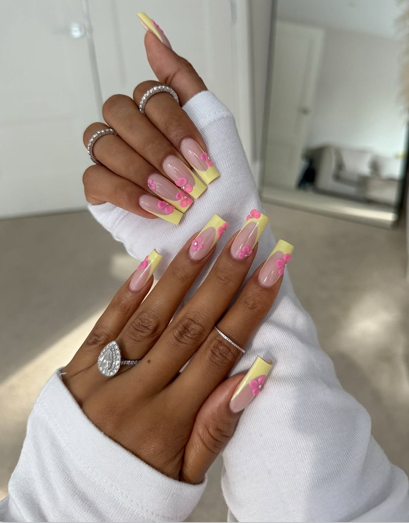 Yellow French Tip Nails with 3D Pink Flowers