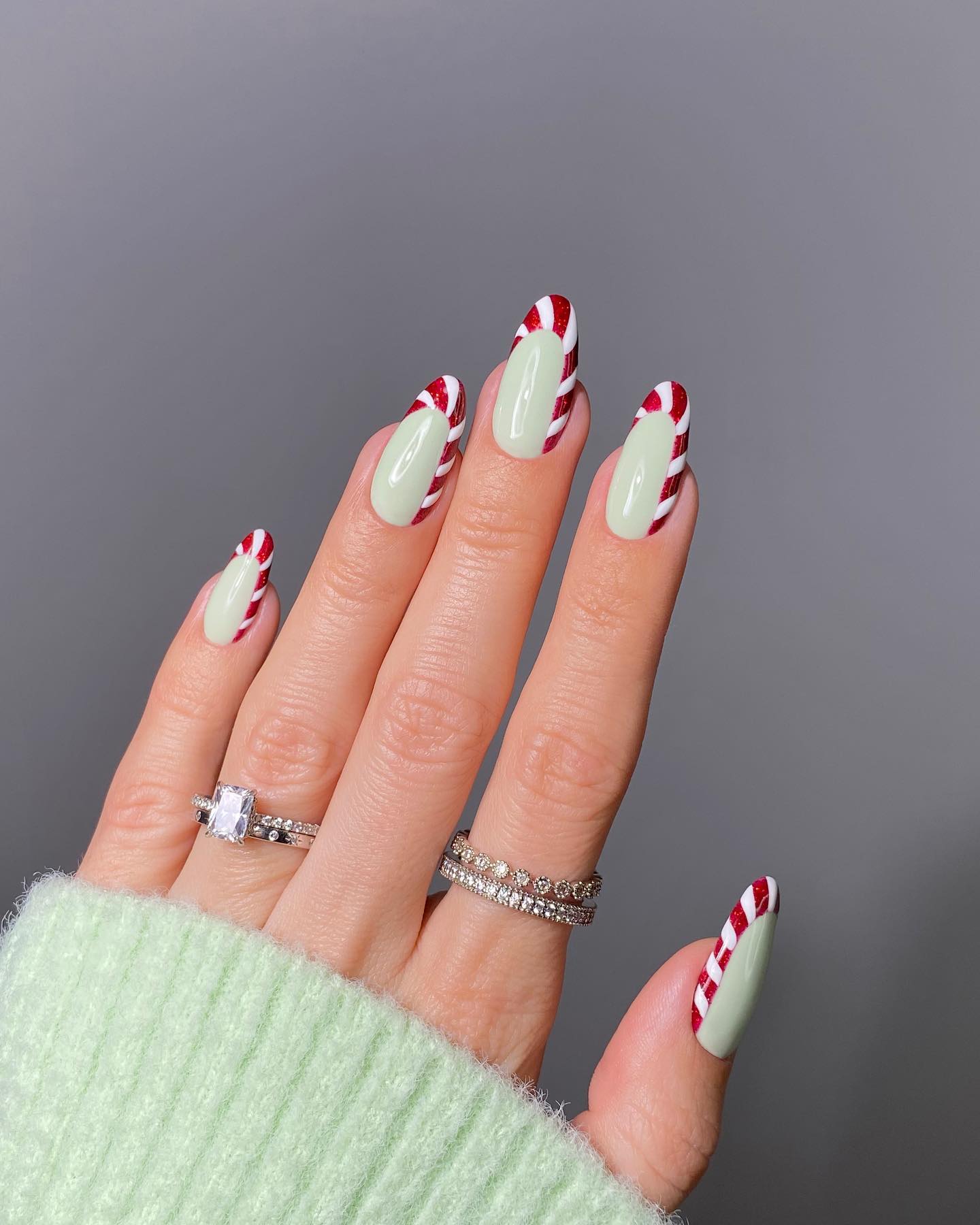 Candy Cane Swirl French Tip Almond Nails