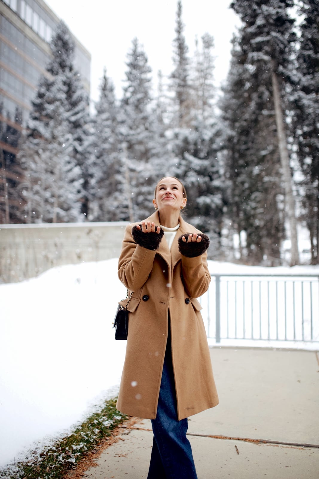 Camel wool coat with white sweater and dark jeans — Casual Winter Outfits