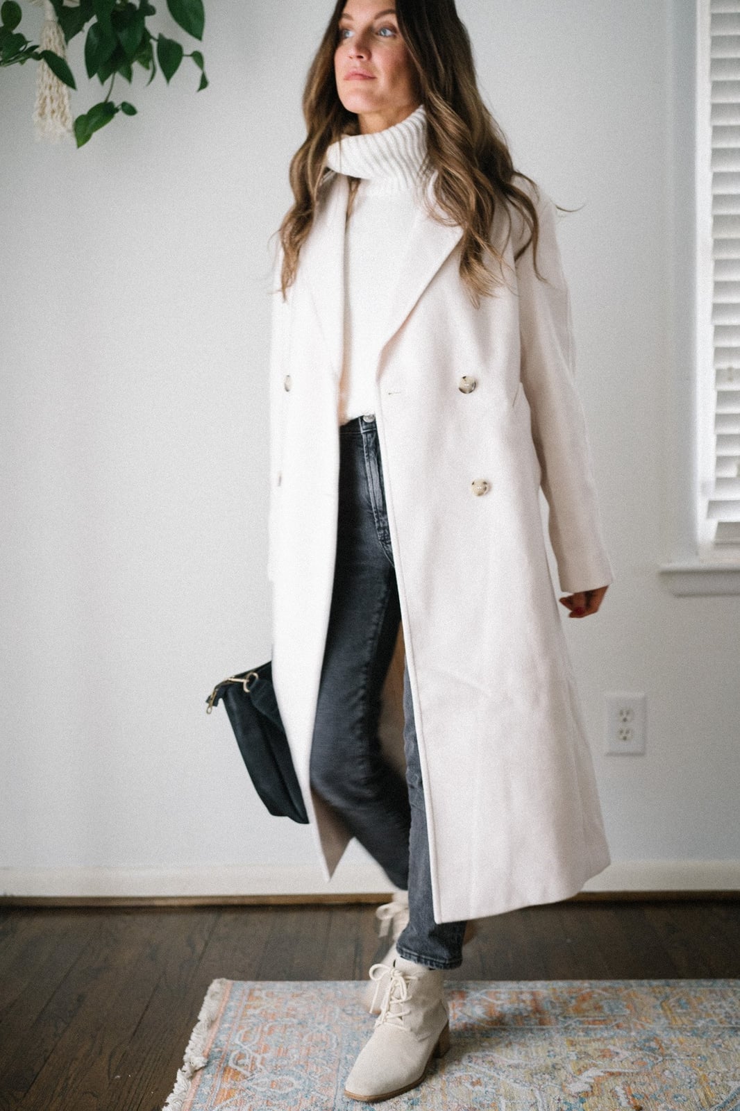 Off-white wool coat with cream turtleneck and gray boots — Casual Winter Outfits